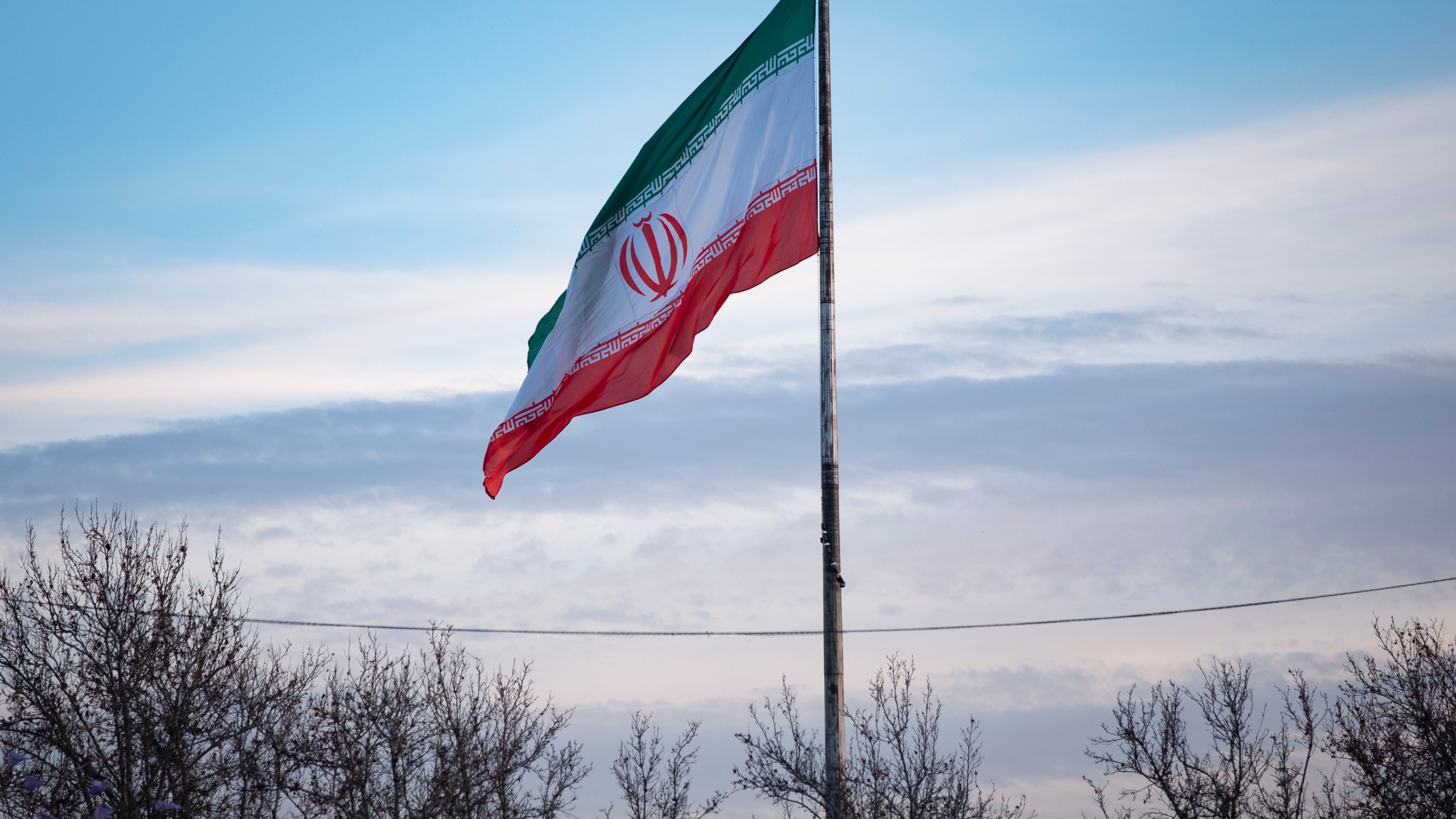 Iranian flag waves