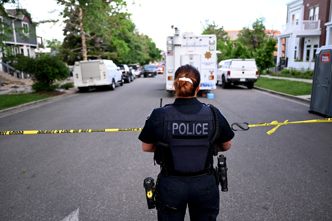 police officer works the scene