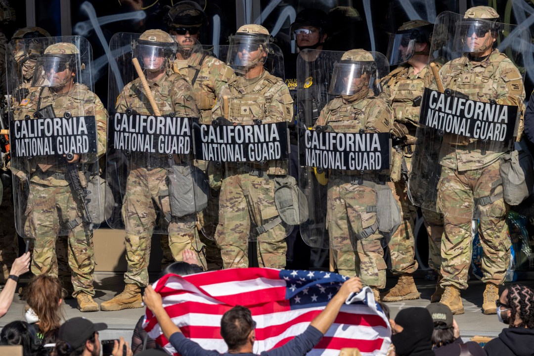 Protesters confront California National Guard soldiers and police
