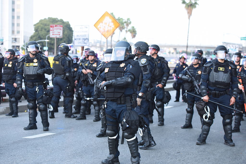 The Los Angeles Metro Police stand guard as protests against Trump's ICE policies.