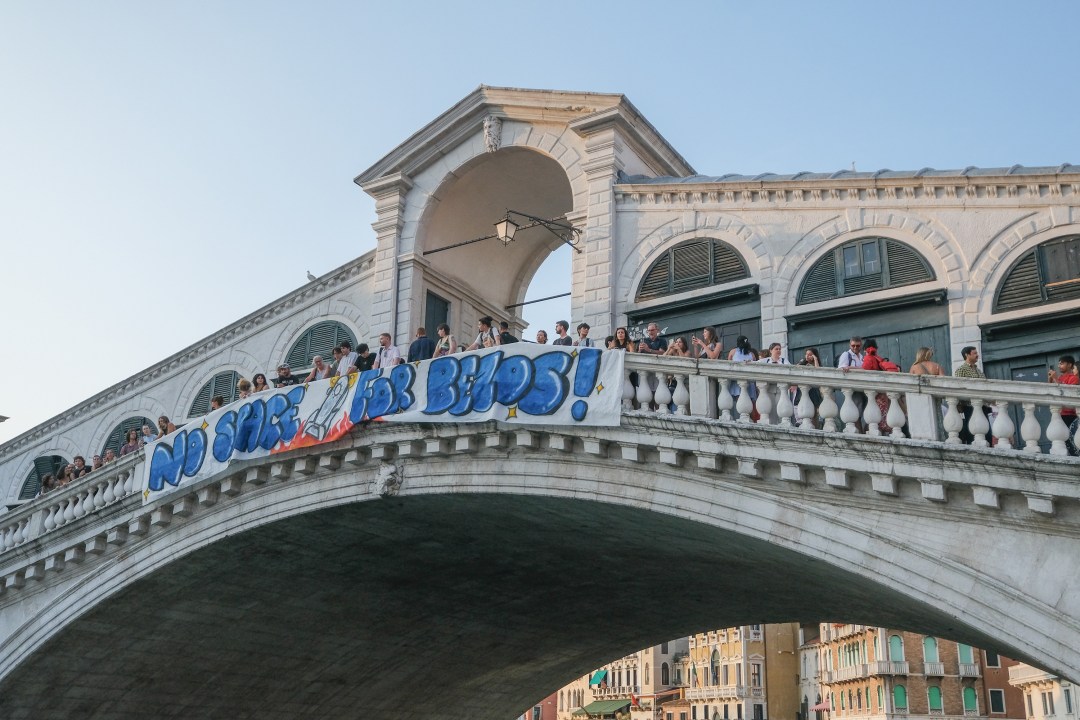 "No Space For Bezos" sign on bridge