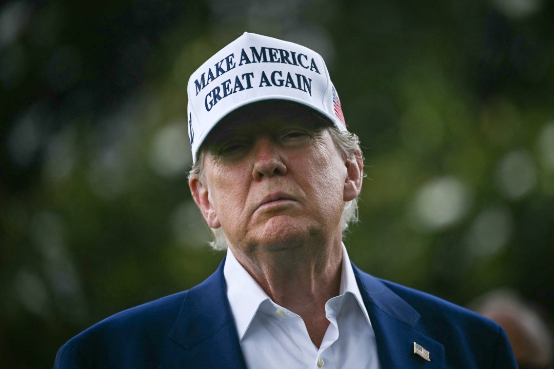 President Donald Trump wearing a MAKE AMERICA GREAT AGAIN hat