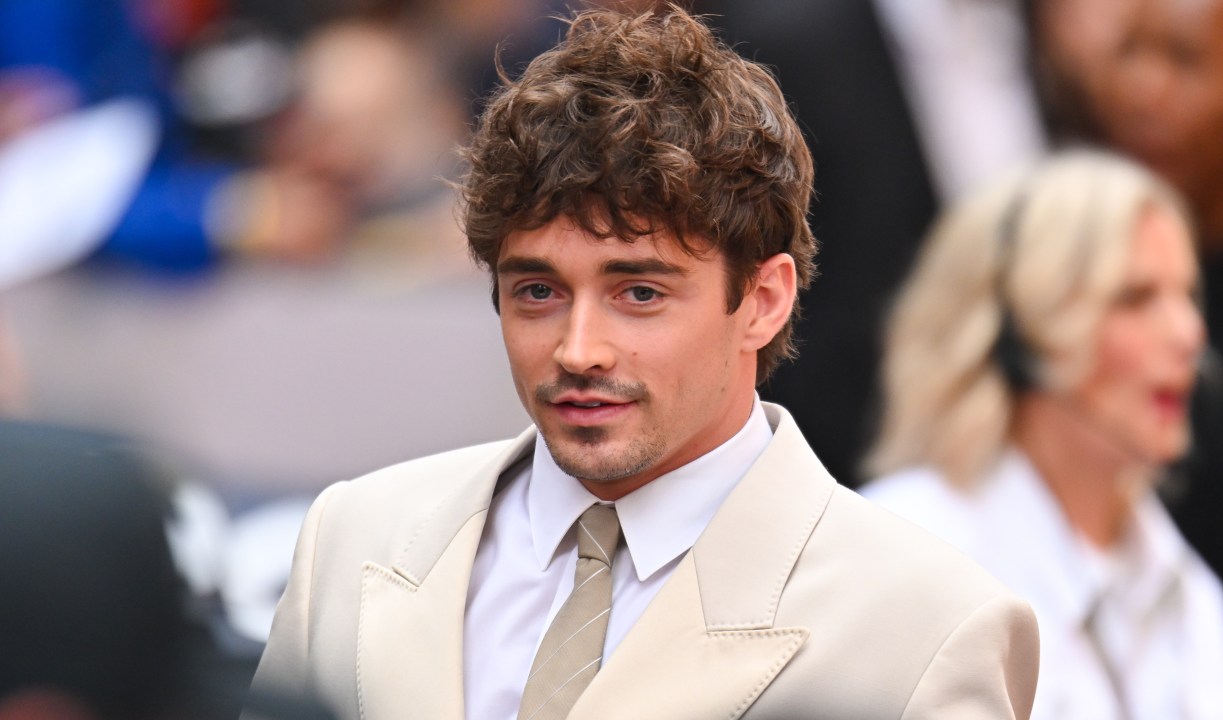 Charles Leclerc arrives at a movie premiere