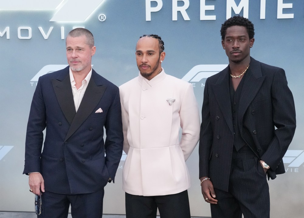 Brad Pitt, Lewis Hamilton and Damson Idris pose for photos on the red carpet