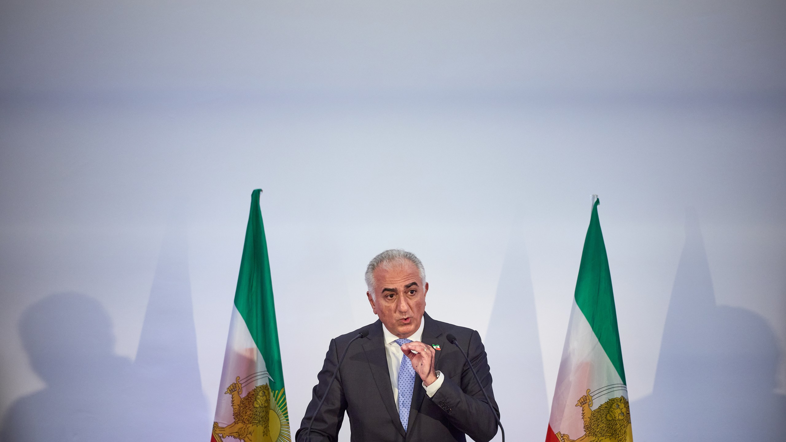 Reza Pahlavi, the eldest son of the last Shah of Iran, gestures as he addresses the media during a press conference on June 23, 2025 in Paris, France.