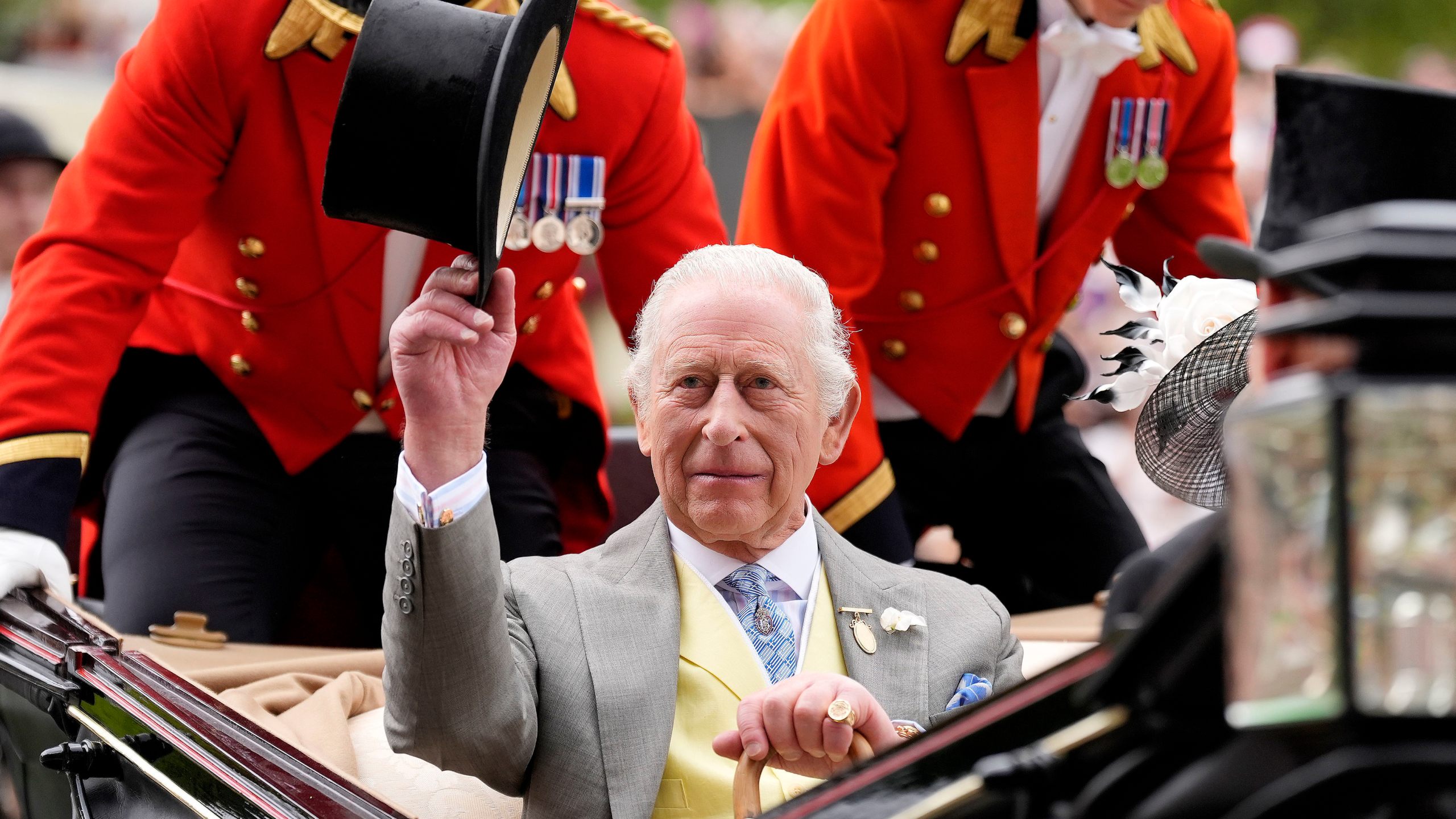 Britain's King Charles III arrives by royal carriage during day five of Royal Ascot at Ascot Racecourse, England, Saturday June 21, 2025. (Andrew Matthews/PA via AP)