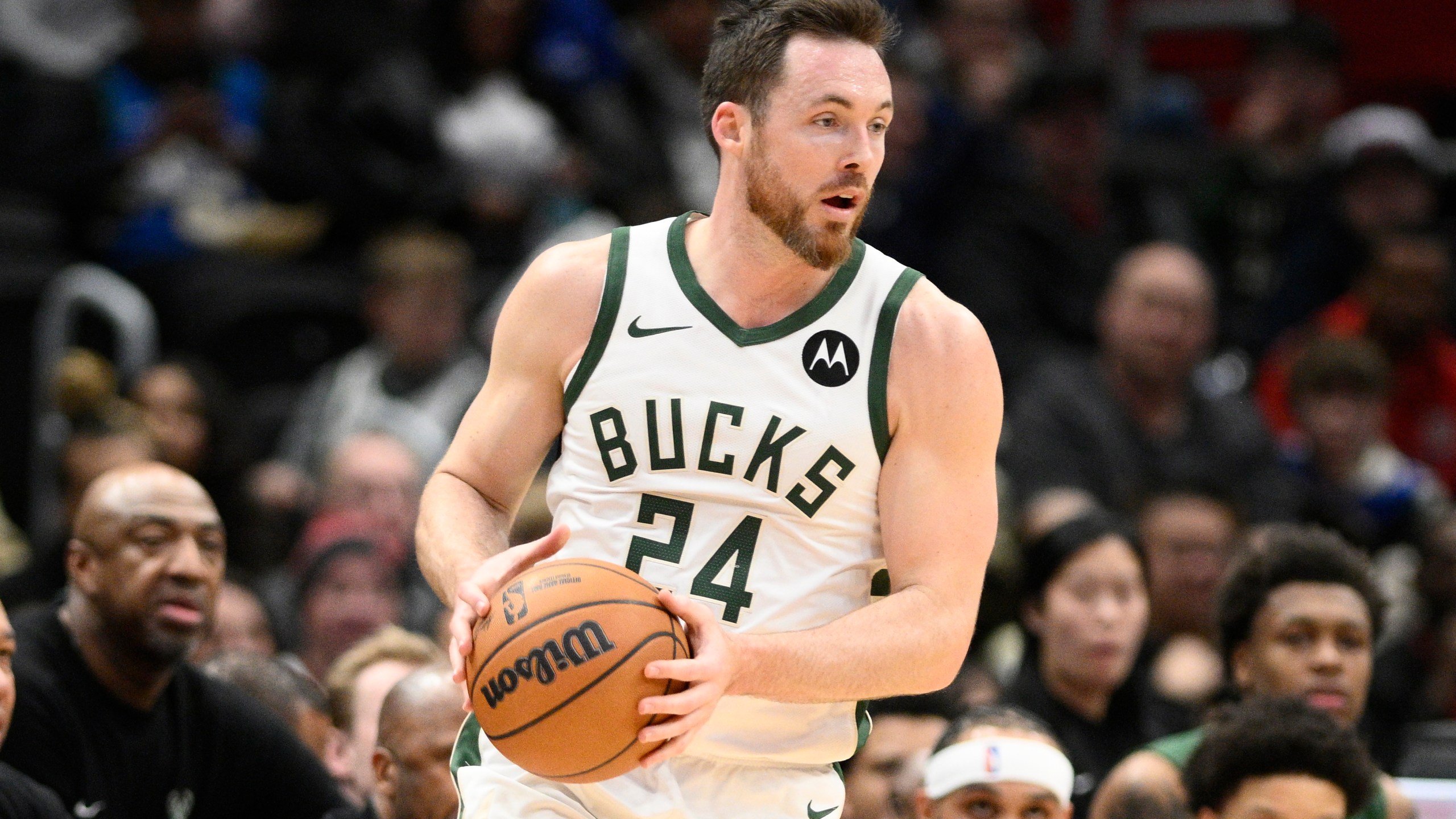 FILE - Milwaukee Bucks guard Pat Connaughton controls the ball during the first half of an NBA basketball game against the Washington Wizards, Feb. 21, 2025, in Washington. (AP Photo/Nick Wass, file)