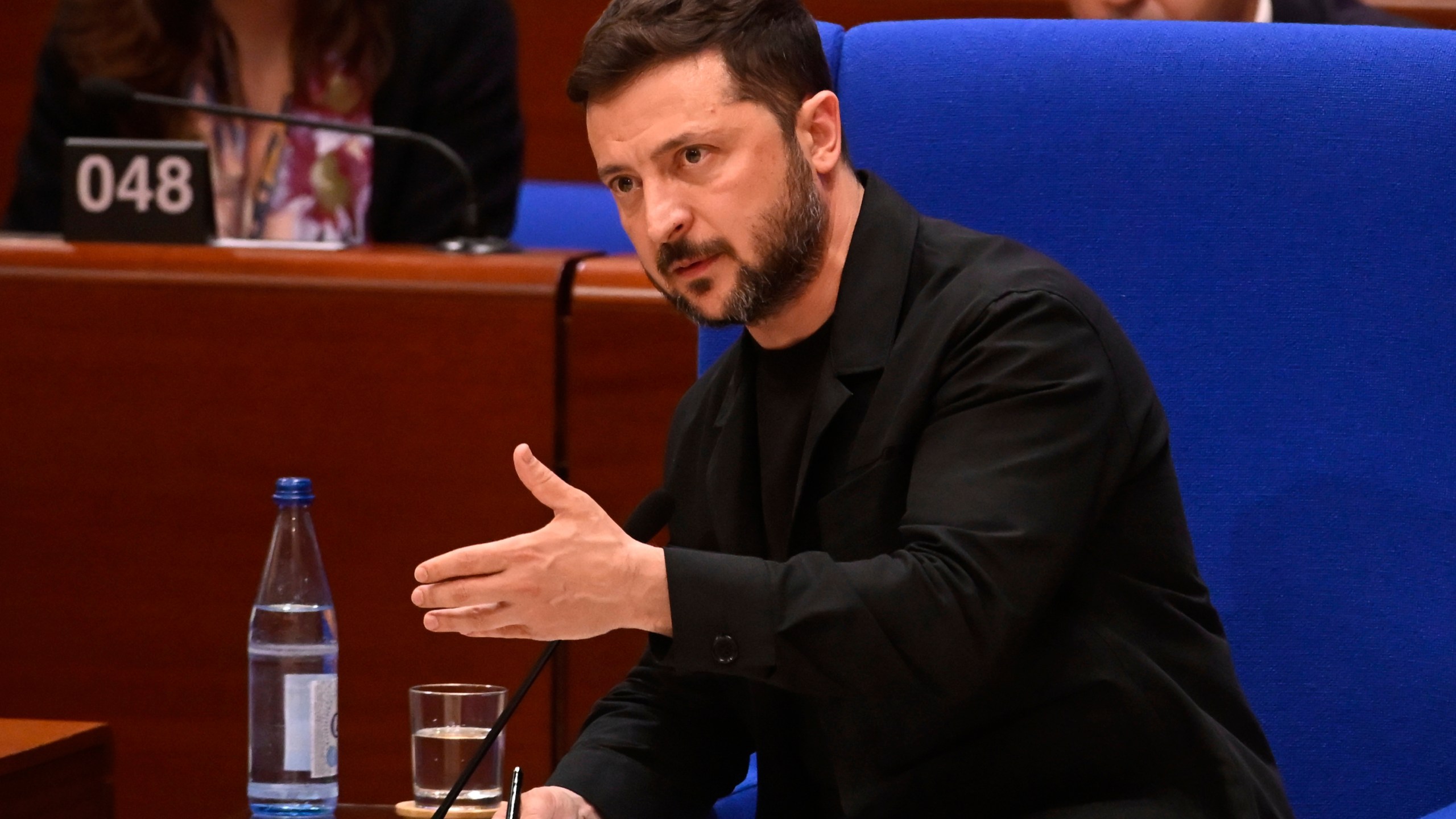 Ukraine's President Volodymyr Zelenskyy delivers a speech at the Council of Europe after signing the legal instruments necessary to launch the Special Tribunal for the Crime of Aggression against Ukraine, in Strasbourg, eastern France, Wednesday, June 25, 2025. (AP Photo/Pascal Bastien)