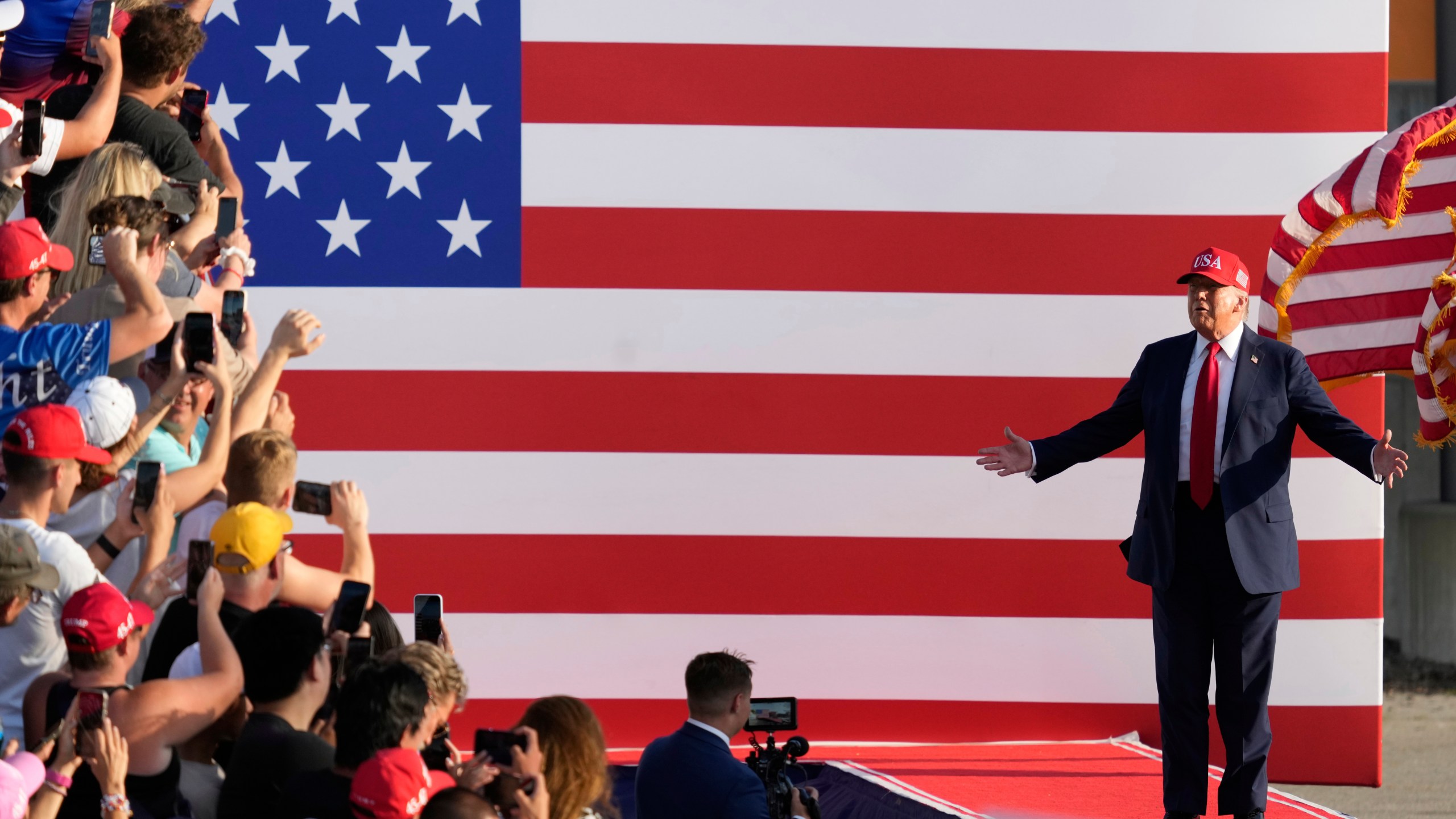 President Donald Trump arrives to speak at a rally at the Iowa State Fairgrounds, Thursday, July 3, 2025, in Des Moines, Iowa. (AP Photo/Charlie Neibergall)