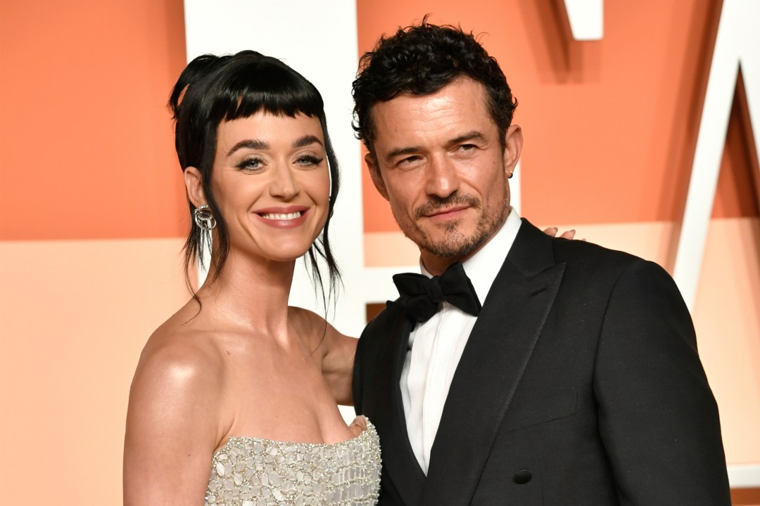 FILE - Katy Perry and Orlando Bloom appear at the Vanity Fair Oscar Party in Beverly Hills, Calif., on March 2, 2025. (Photo by Evan Agostini/Invision/AP, File)