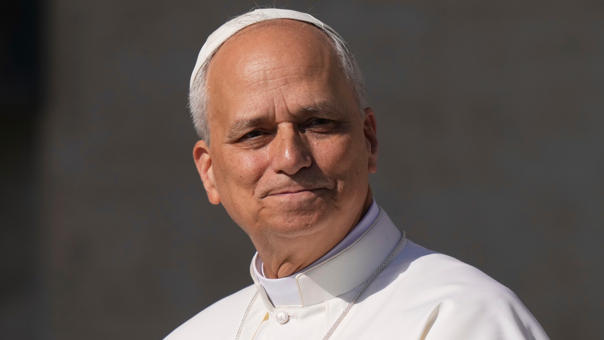 FILE - Pope Leo XIV arrives in St. Peter's Square to hold his weekly general audience, at the Vatican, Wednesday, June 25, 2025. (AP Photo/Andrew Medichini, File)