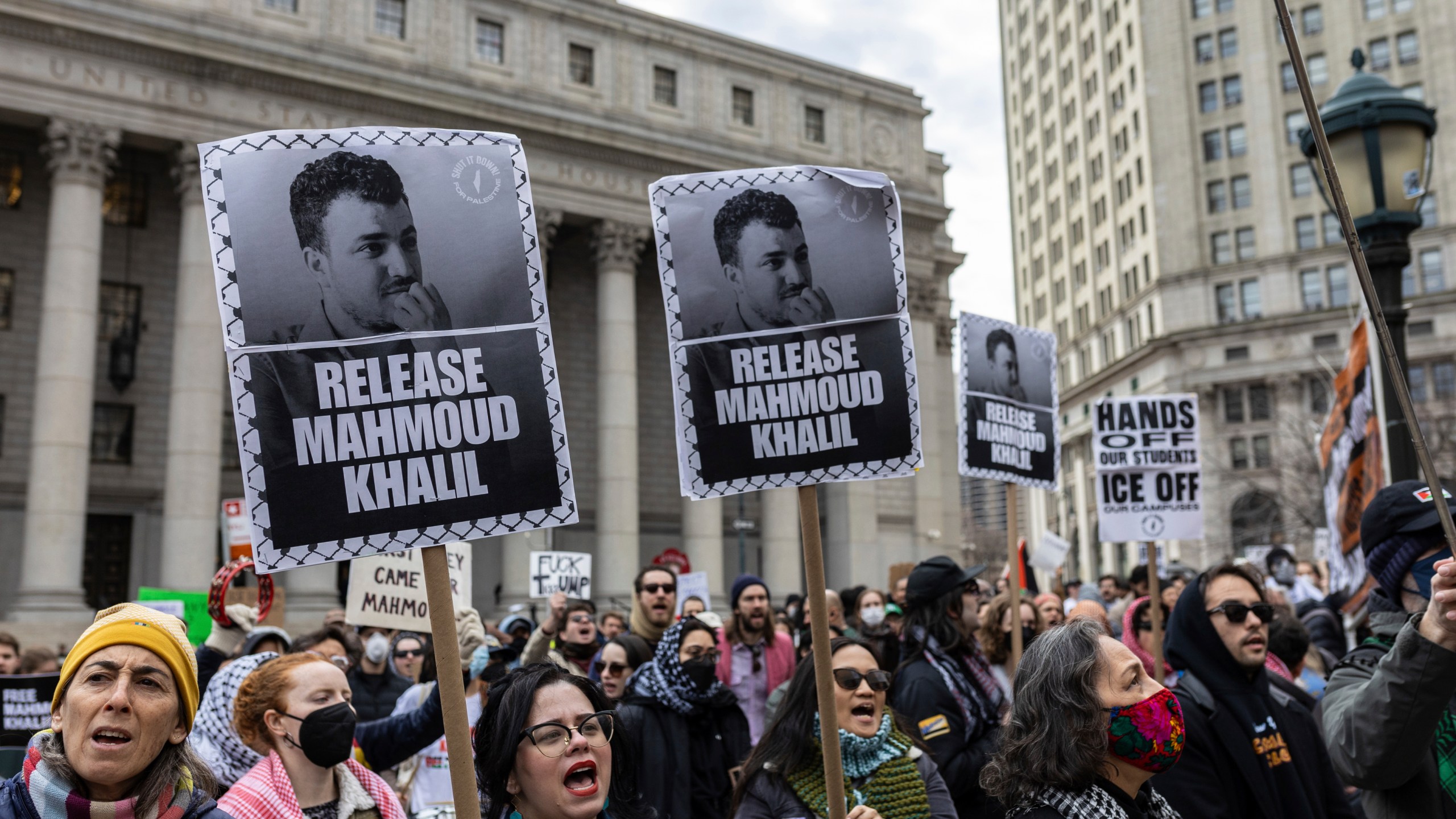A crowd gathers outside the Manhattan federal court