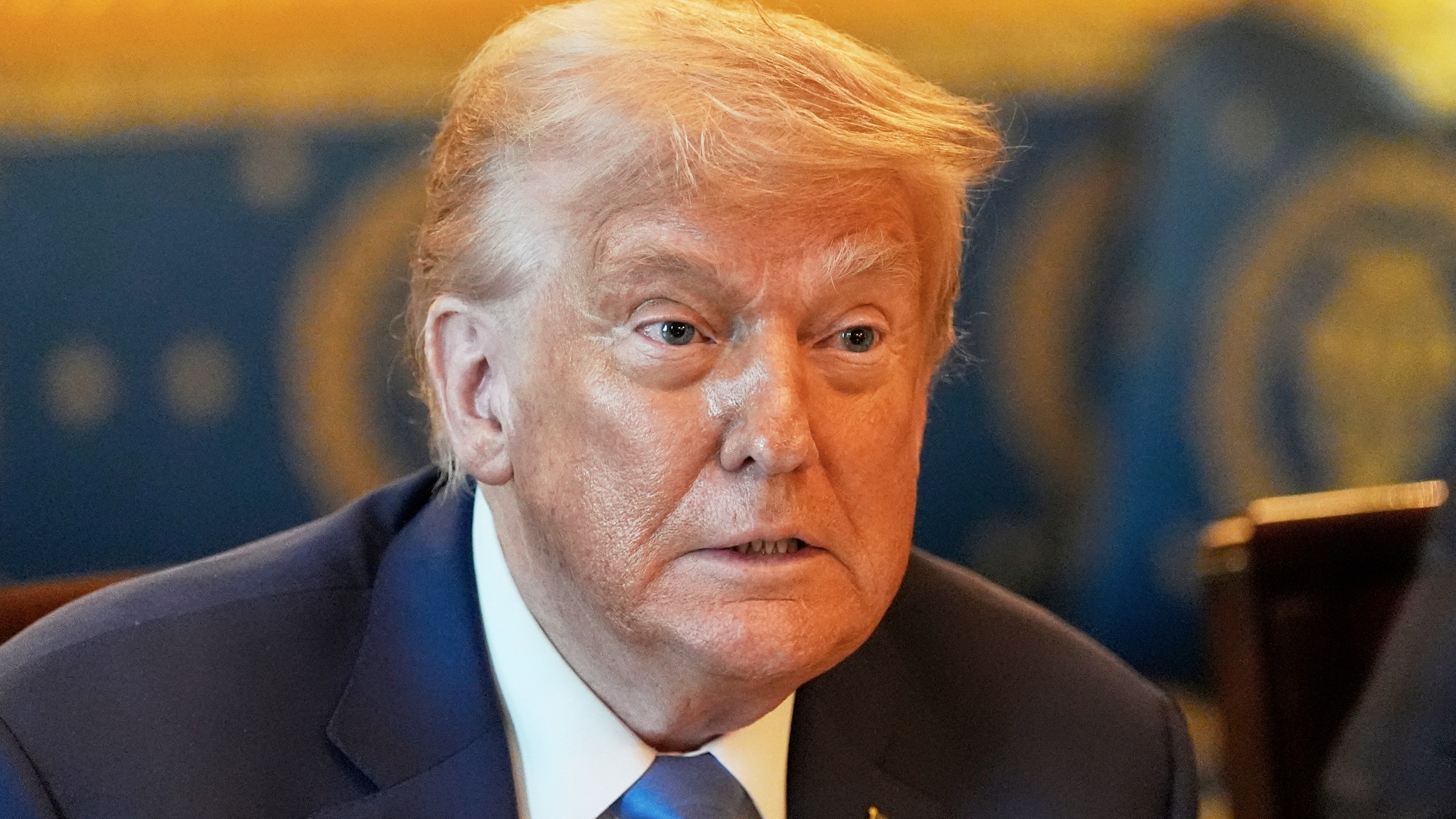 President Donald Trump attends a meeting with Israel's Prime Minister Benjamin Netanyahu in the Blue Room of the White House, Monday, July 7, 2025, in Washington. (AP Photo/Alex Brandon)