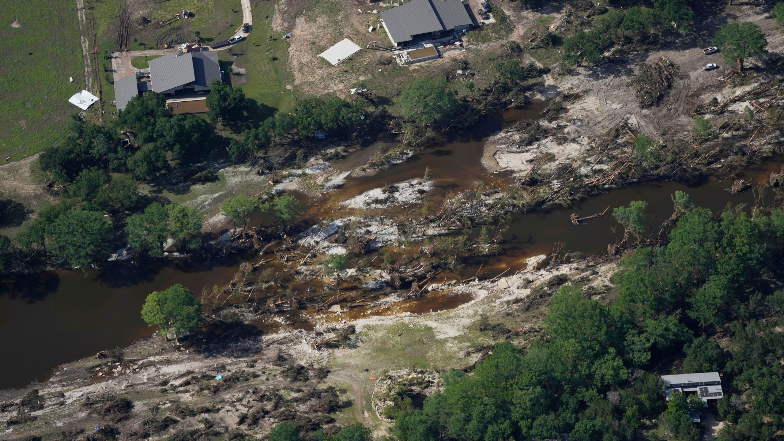 Damage is seen next to the Guadalupe River on Tuesday, July 8, 2025, after a flash flood swept through the area near Ingram, Texas. (AP Photo/Ashley Landis)