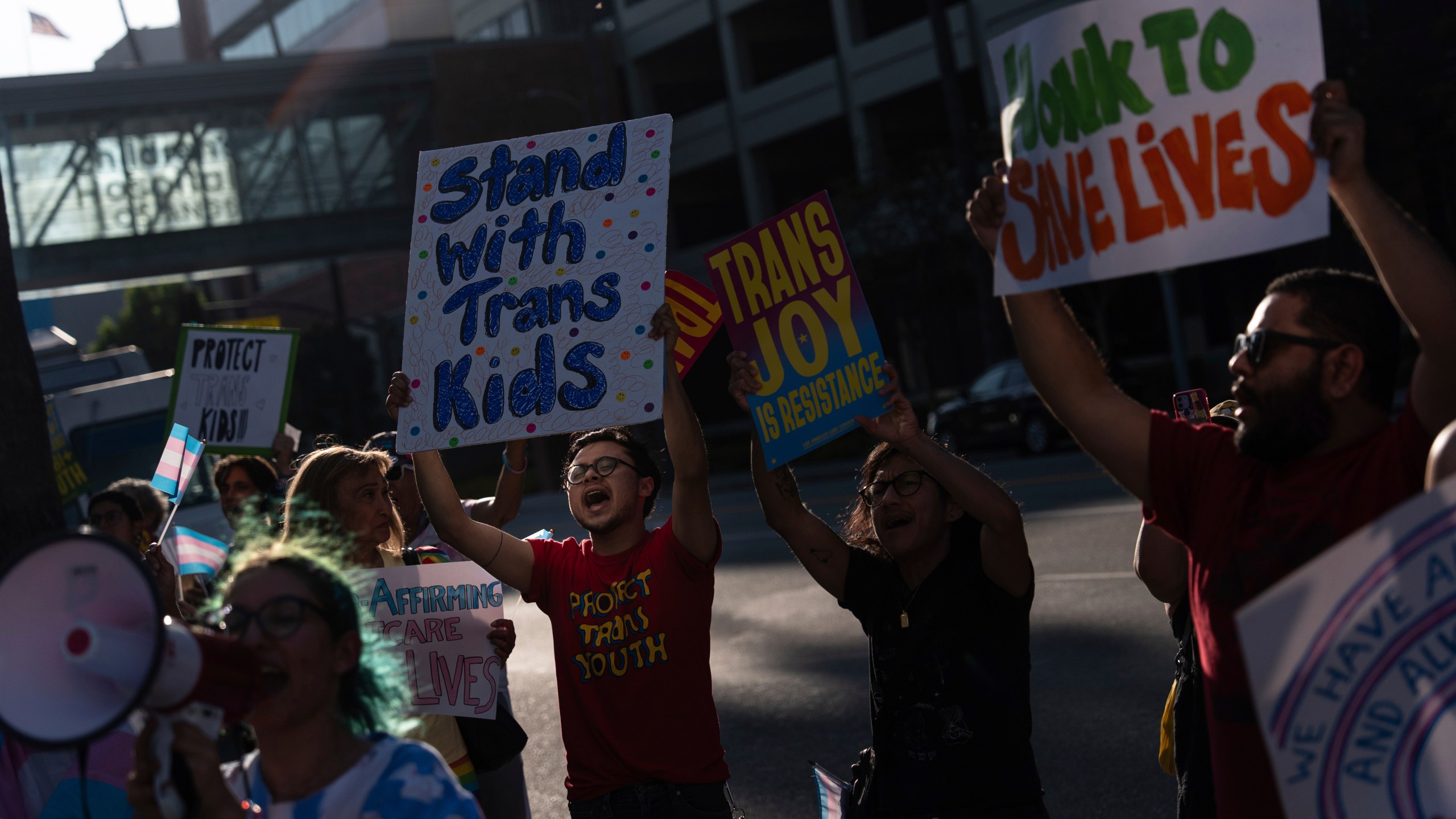 Protesters chant slogans while demonstrating against the closure of the trans youth clinic at Children's Hospital Los Angeles, Thursday, July 3, 2025, in Los Angeles. (AP Photo/Jae C. Hong)