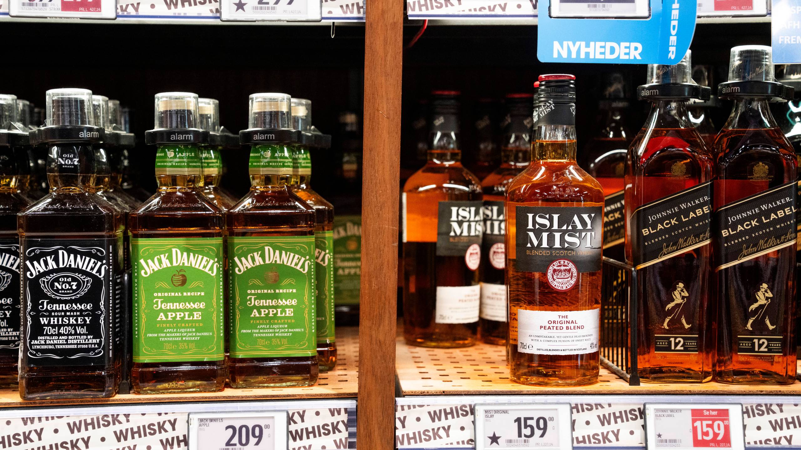FILE - Bottles of spirits are labeled with a star in Bilka in Randers, Denmark, making it easier for customers to buy European goods, Monday, March 17, 2025. (Bo Amstrup/Ritzau Scanpix via AP, File)