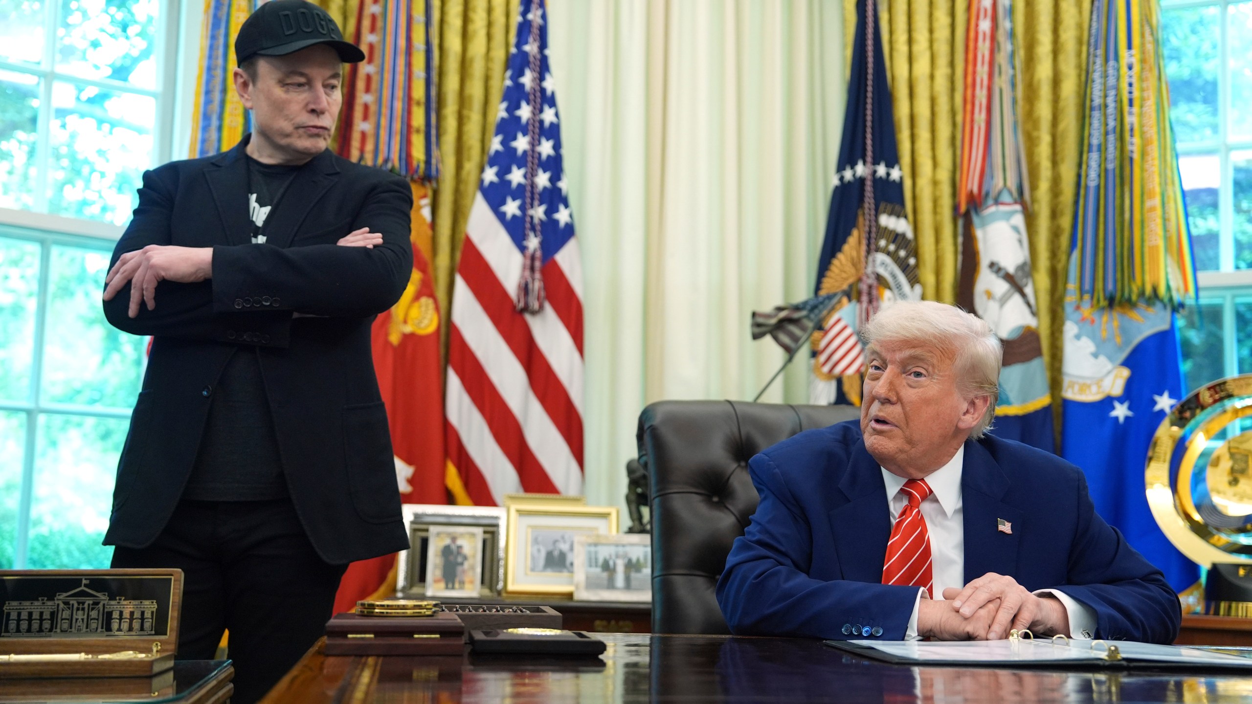 FILE - President Donald Trump, right, speaks during a news conference with Elon Musk in the Oval Office of the White House, in Washington, May 30, 2025,. (AP Photo/Evan Vucci, File)
