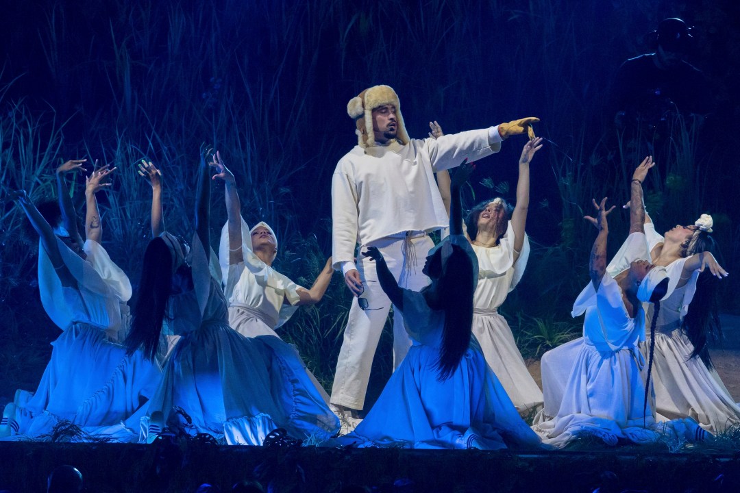 Bad Bunny performs during his first show of his 30-date concert residency at the Coliseo de Puerto Rico José Miguel Agrelot, in San Juan, Puerto Rico, Friday, July 11, 2025. (AP Photo/Alejandro Granadillo)