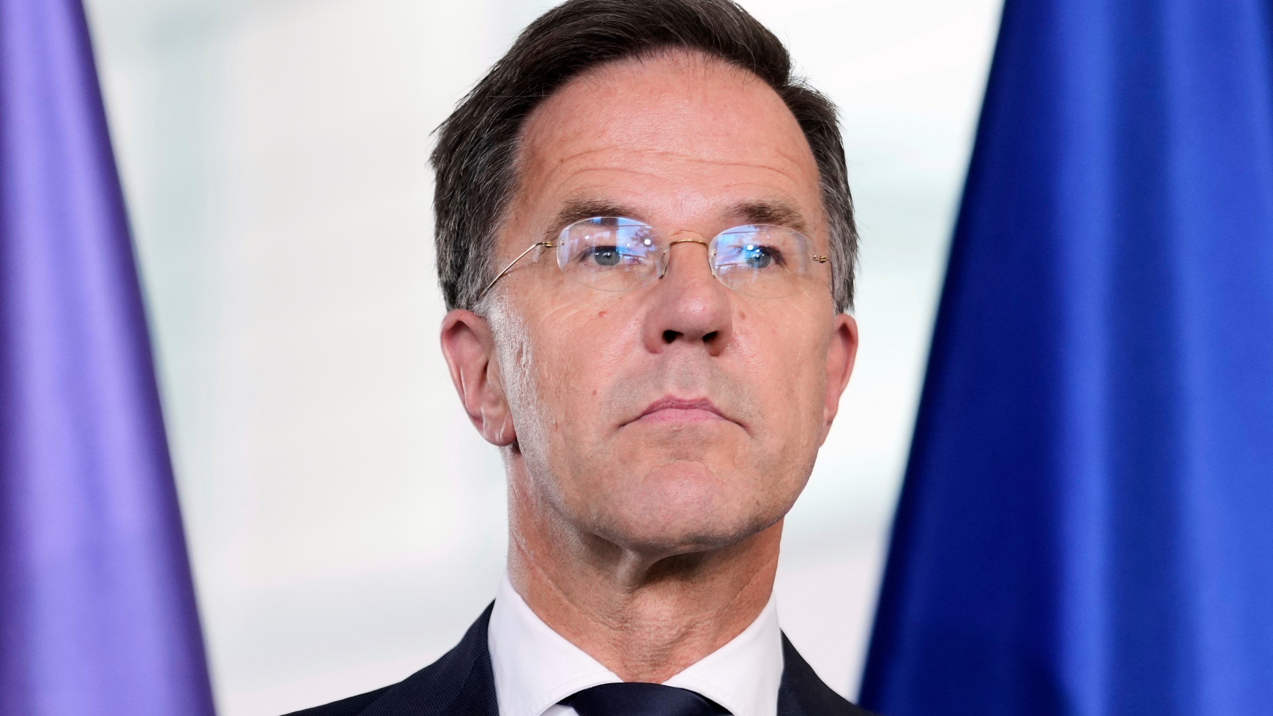 NATO Secretary General Mark Rutte attends a news conference with German Chancellor Friedrich Merz during a meeting at the chancellery in Berlin, Germany, Wednesday, July 9, 2025. (AP Photo/Markus Schreiber)