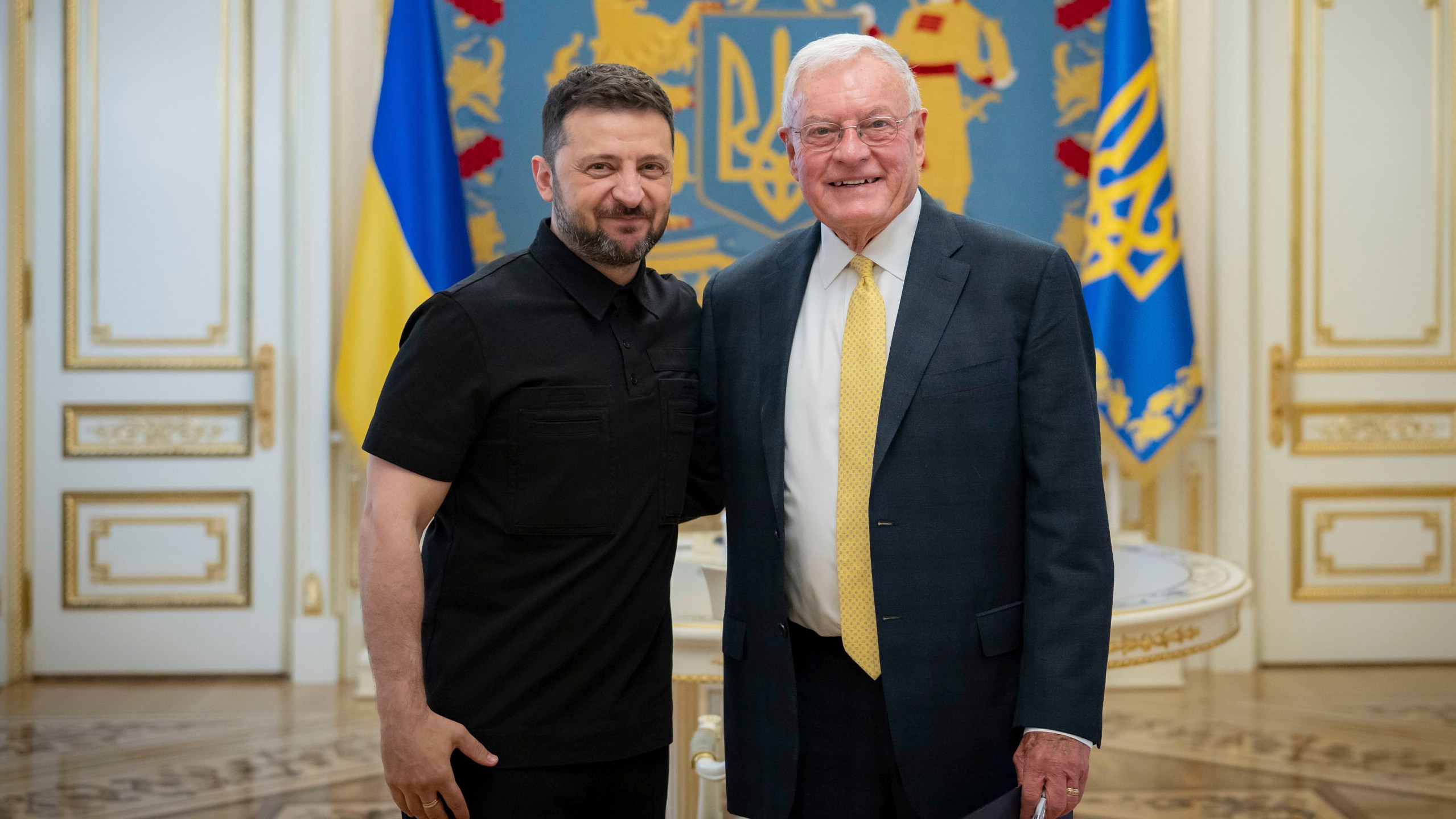 Ukrainian President Volodymyr Zelenskyy, left, and United States Special Envoy for Ukraine and Russia, Joseph Keith Kellogg pose for a photo in Kyiv, Ukraine, Monday, July 14, 2025. (Ukrainian Presidential Press Office via AP)