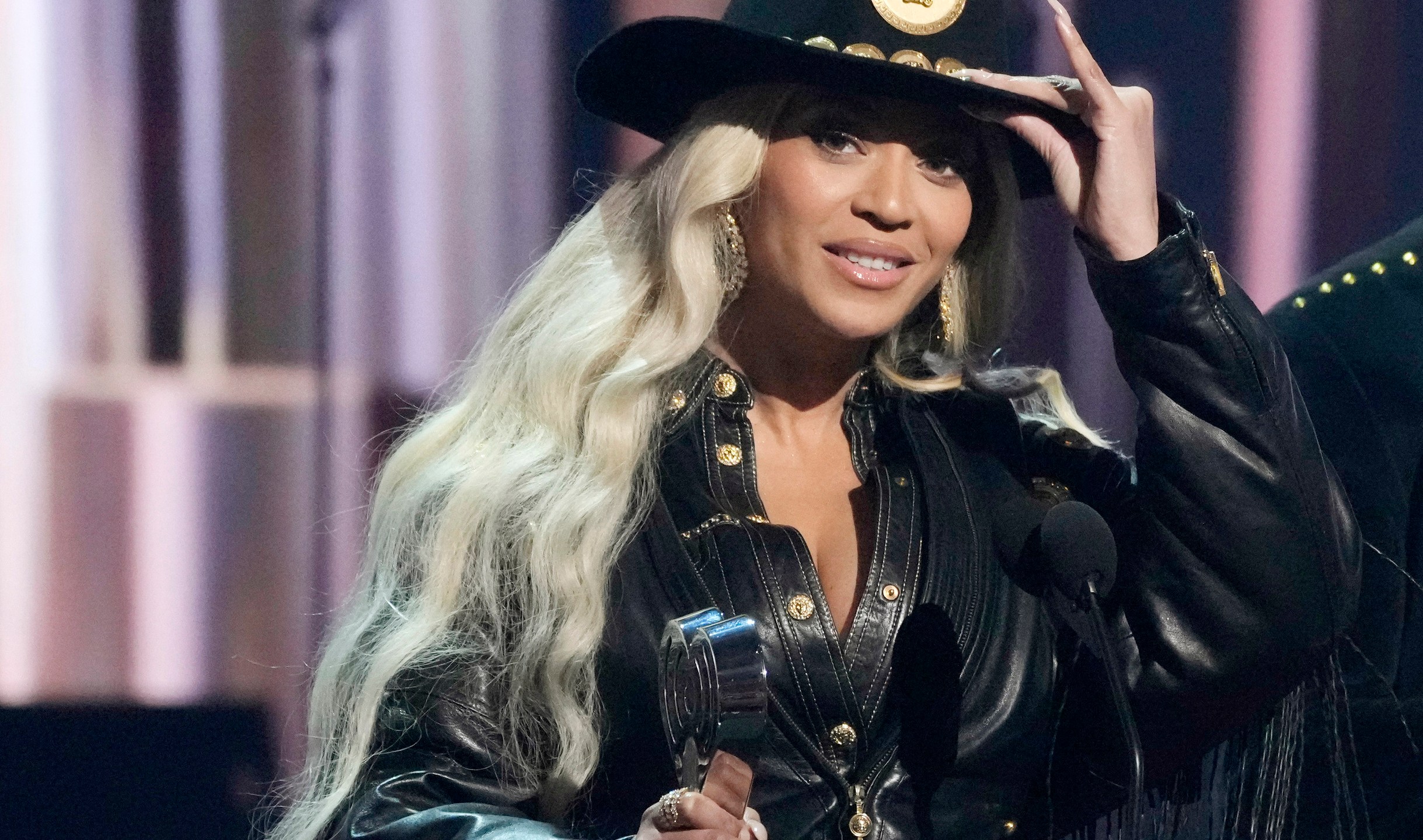 FILE - Beyonce, left, accepts the Innovator Award during the iHeartRadio Music Awards, April 1, 2024, at the Dolby Theatre in Los Angeles. (AP Photo/Chris Pizzello, File)