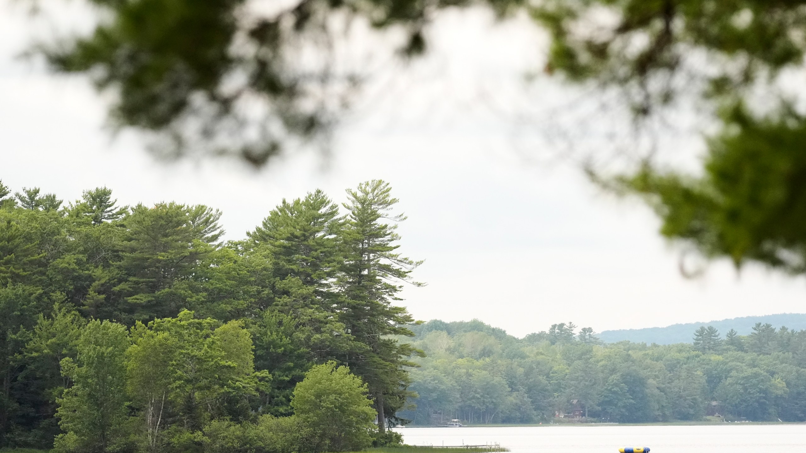 Crawford Pond is seen Wednesday, July 9, 2025, in Union, Maine. Police are investigating the murder of a woman last seen paddleboarding on the pond. (AP Photo/Robert F. Bukaty)