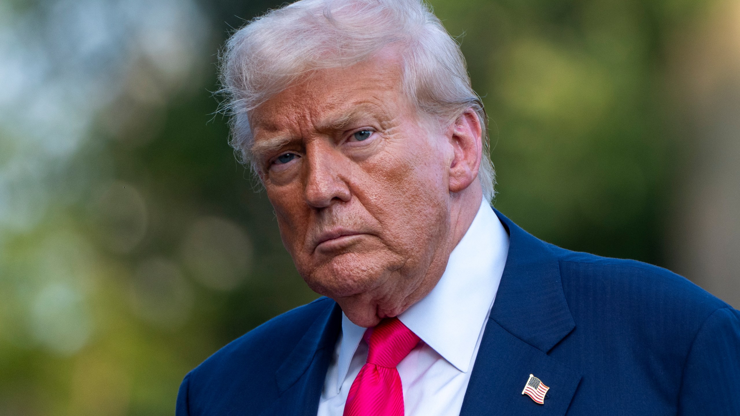 FILE - President Donald Trump walks from Marine One after arriving on the South Lawn of the White House, Tuesday, July 15, 2025, in Washington. (AP Photo/Alex Brandon, File)