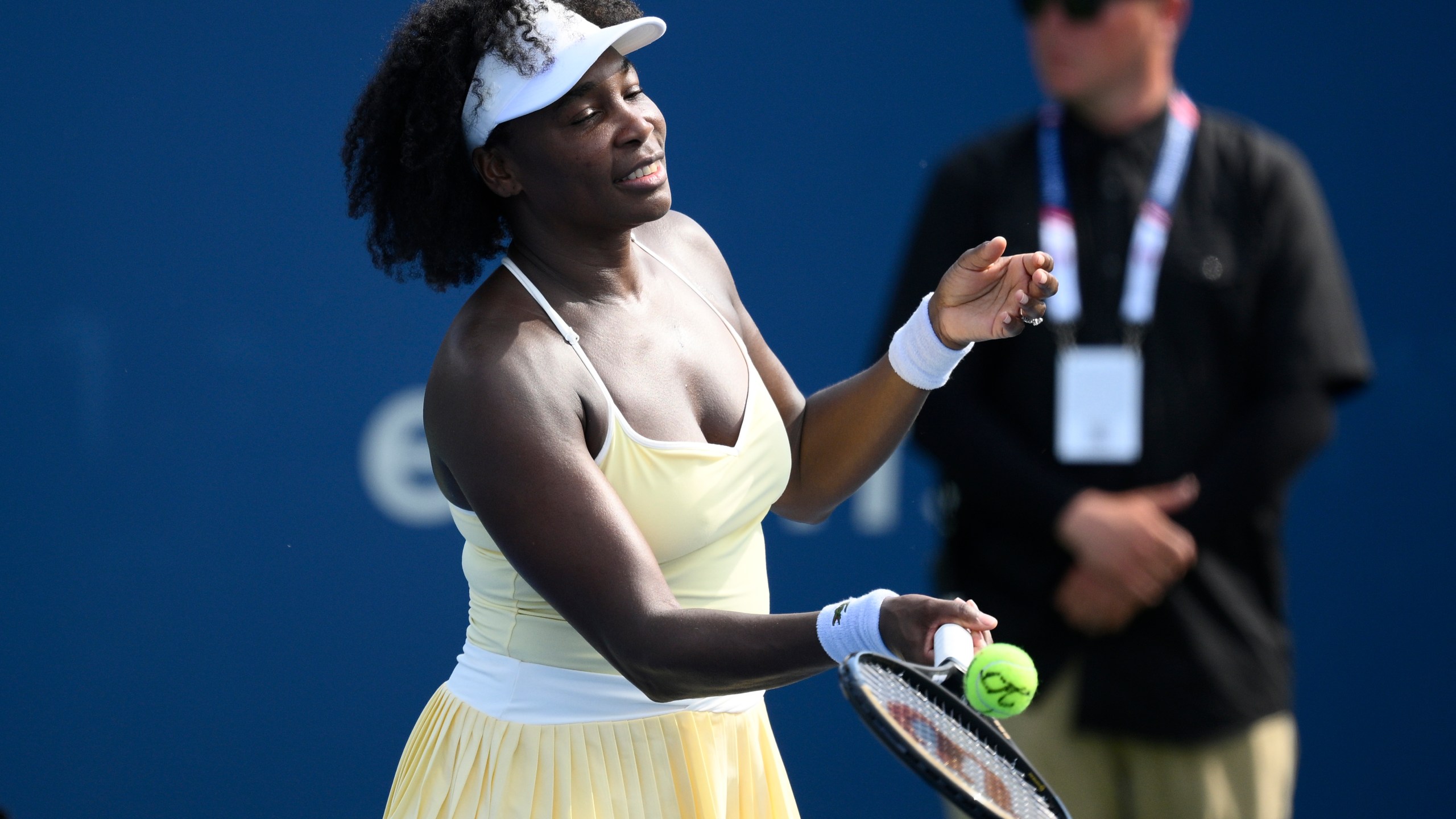 Venus Williams hits a ball toward the crowd after a doubles match with Hailey Baptiste against Eugenie Bouchard and Clervie Ngounoue at the Citi Open tennis tournament Monday, July 21, 2025, in Washington. (AP Photo/Nick Wass)