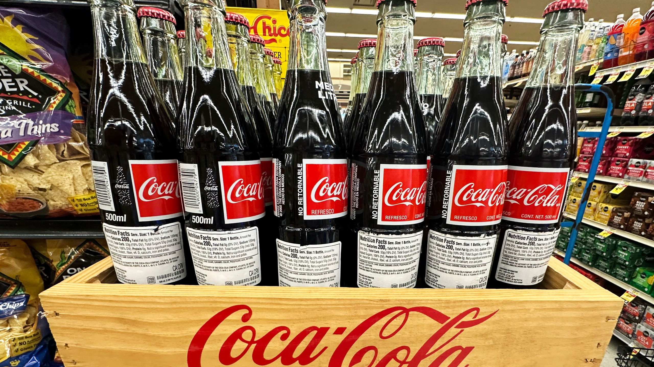 Bottles of Mexican Coca-Cola are displayed at a grocery store in Mount Prospect, Ill., Thursday, July 17, 2025. (AP Photo/Nam Y. Huh)