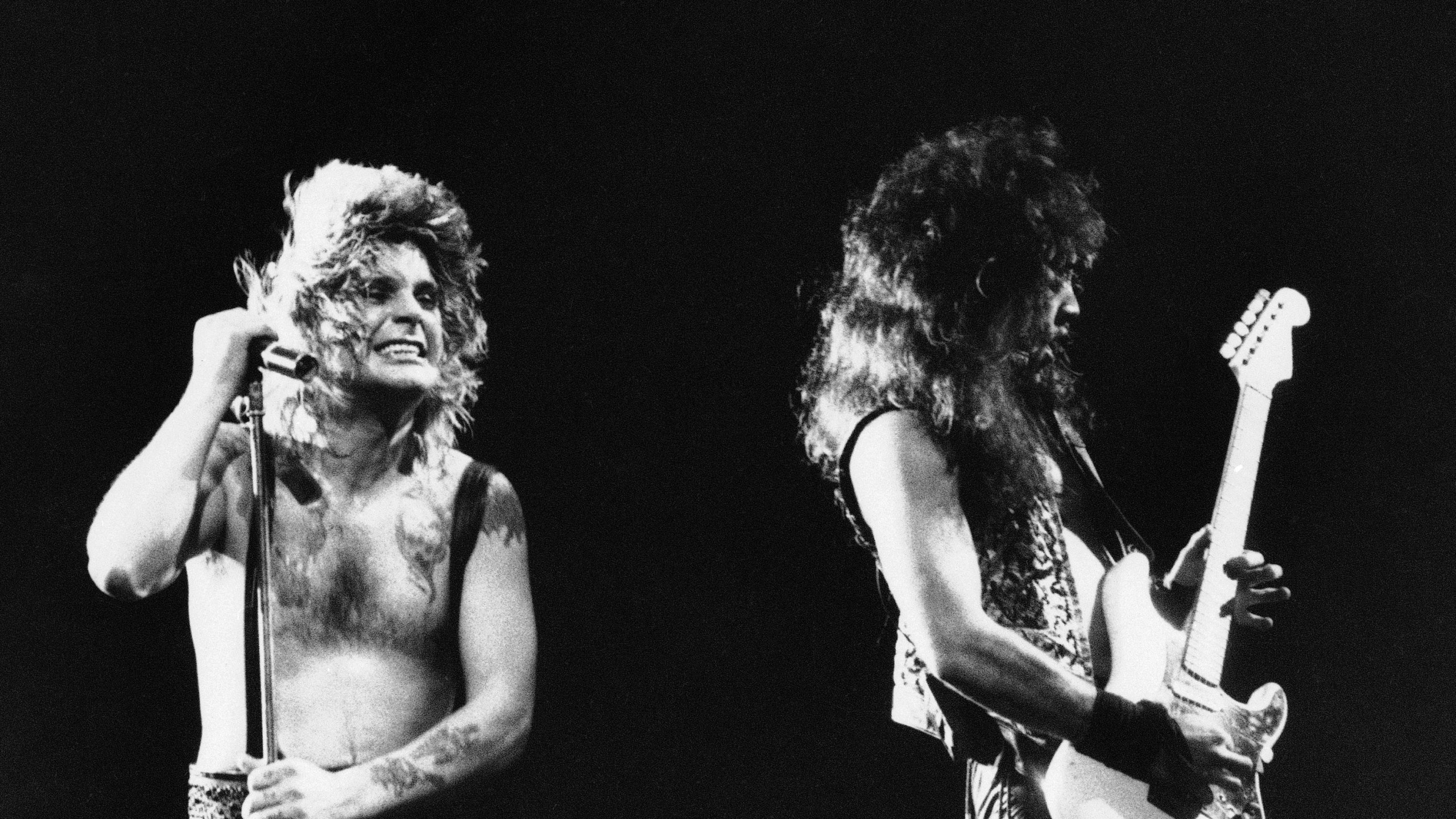 FILE - Ozzy Osbourne, left, performs, Jan. 17, 1985, at the Rock in Rio music festival in Rio de Janeiro, Brazil. (AP Photo, File)