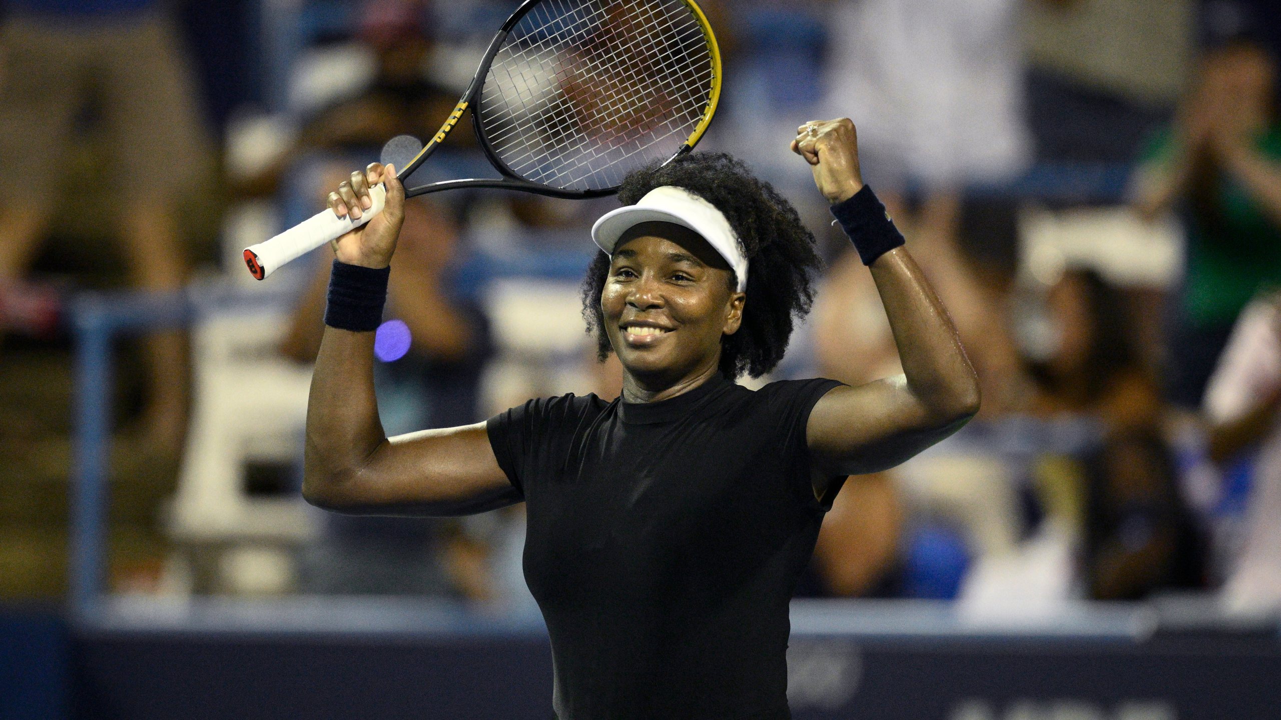 Venus Williams celebrates her win over Peyton Stearns during a match at the Citi Open tennis tournament Tuesday, July 22, 2025, in Washington. (AP Photo/Nick Wass)