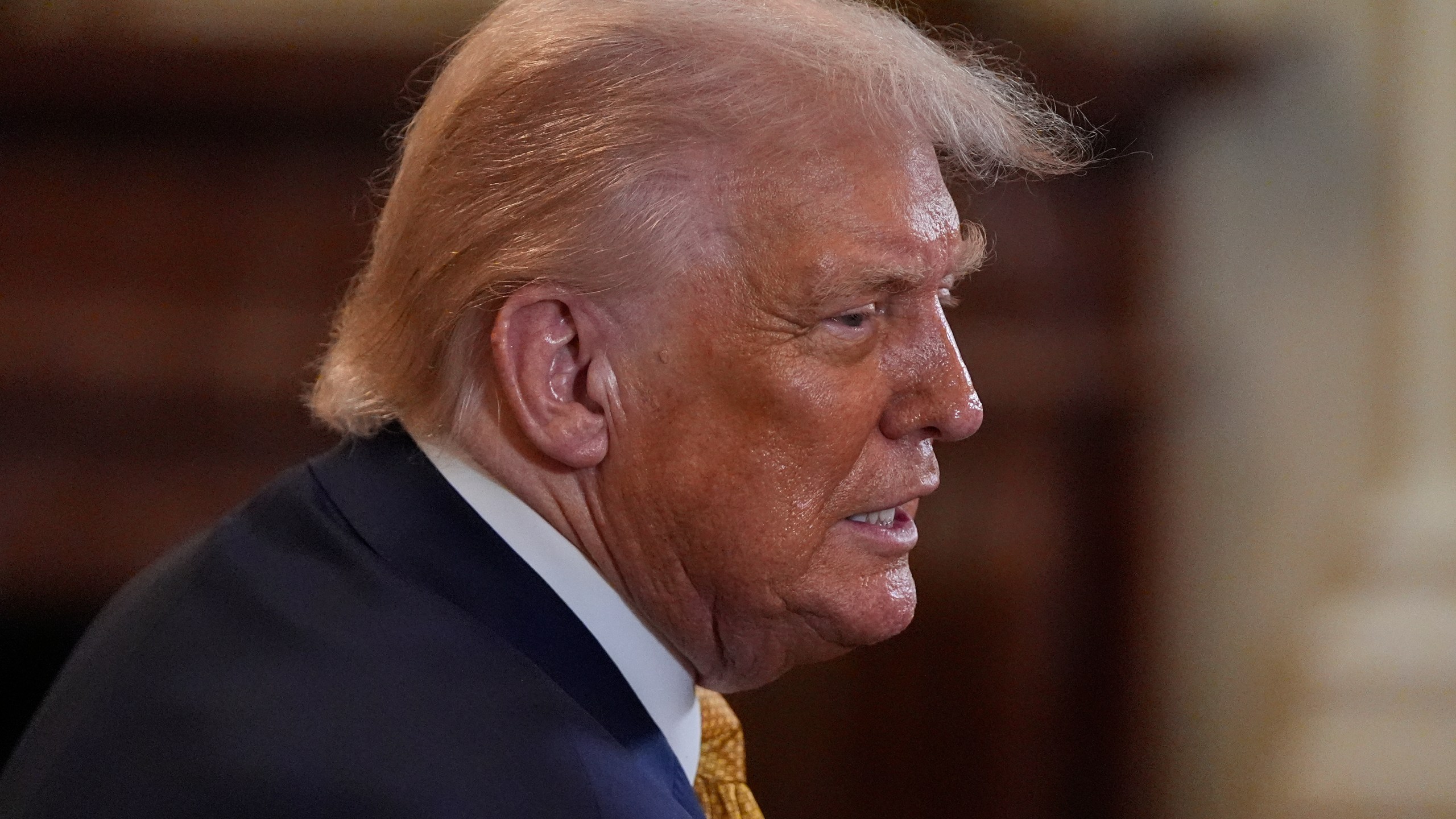 President Donald Trump greets people during a reception for Republican members of Congress in the East Room of the White House, Tuesday, July 22, 2025, in Washington. (AP Photo/Julia Demaree Nikhinson)