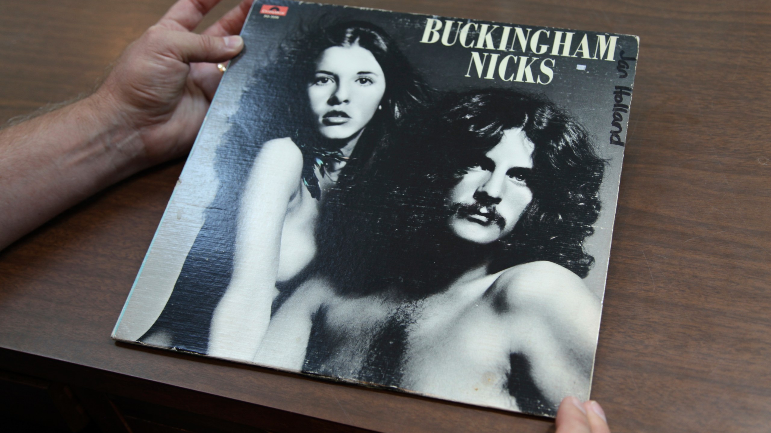 Music historian and journalist Brian Mansfield holds an original pressing of the "Buckingham Nicks" vinyl record at his home in Nashville, Tenn., Wednesday, July 23, 2025. (AP Photo/Kristin M. Hall)