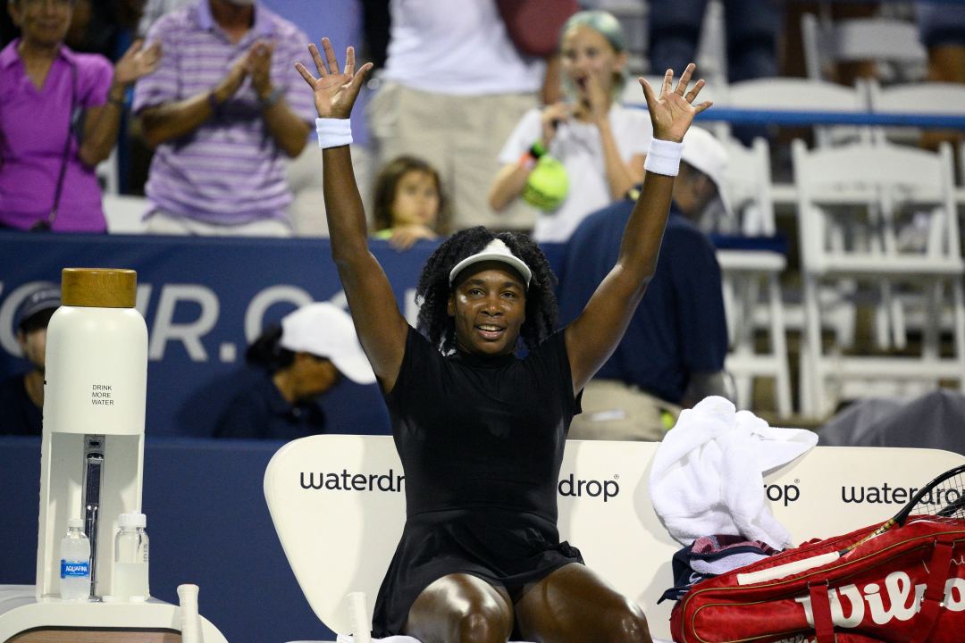 Venus Williams waves to the crowd after she lost to Magdalena Frech, of Poland, during a match at the Citi Open tennis tournament Thursday, July 24, 2025, in Washington. (AP Photo/Nick Wass)