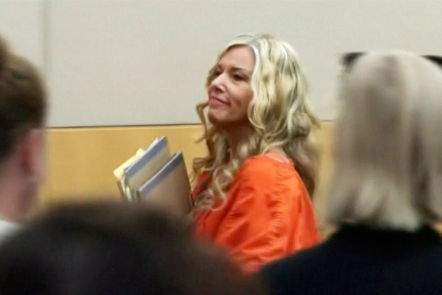 In this image taken from video shows Lori Vallow Daybell, left, speaks to advisory counsel during her sentencing hearing on two murder conspiracy convictions in Phoenix, AZ., on Friday, July 25, 2025. (AP Photo, Pool)