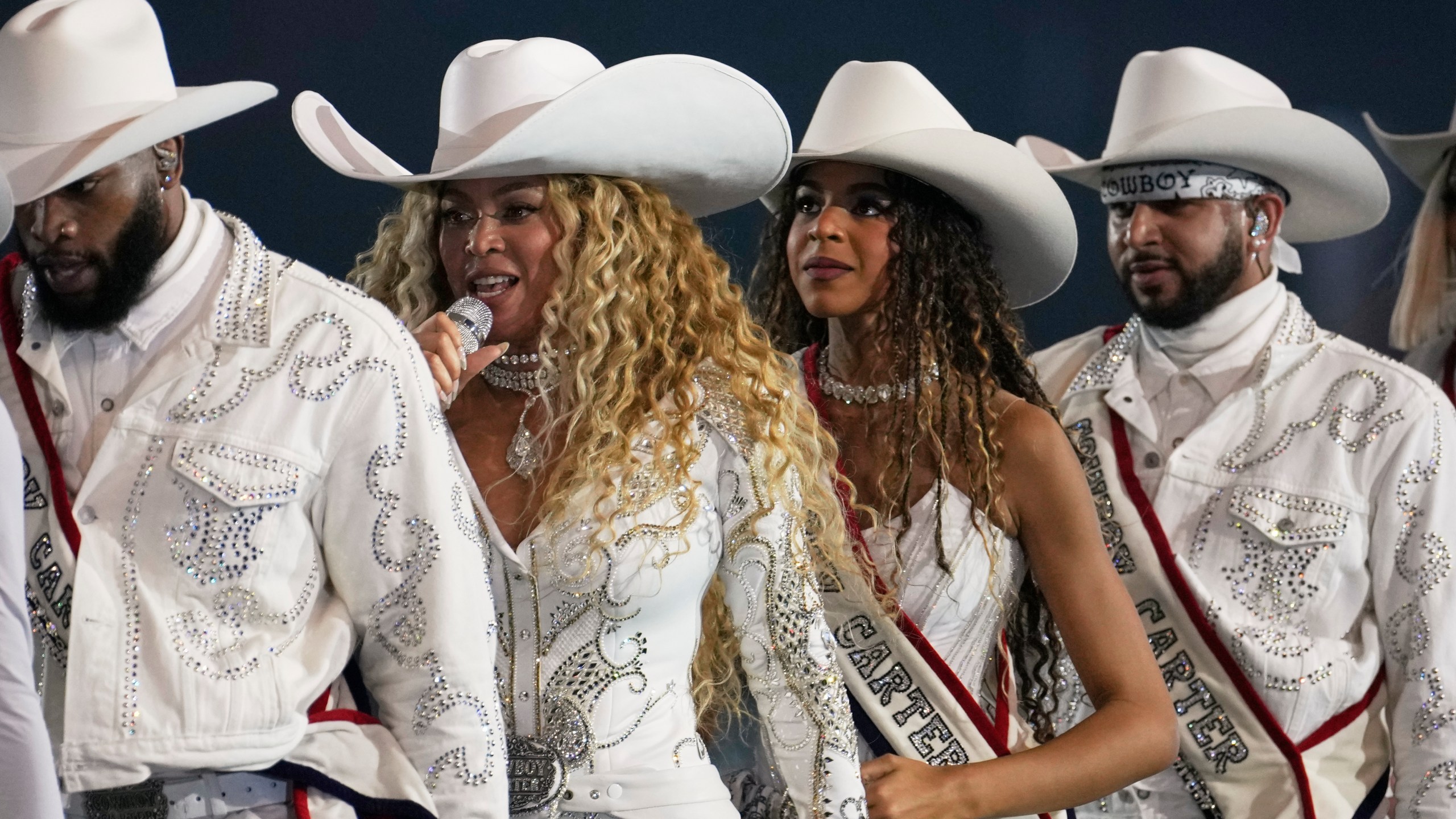 FILE - Beyoncé, center left, and her daughter, Blue Ivy Carter, perform during halftime of an NFL football game between the Baltimore Ravens and Houston Texans Wednesday, Dec. 25, 2024, in Houston. (AP Photo/David J. Phillip, File)