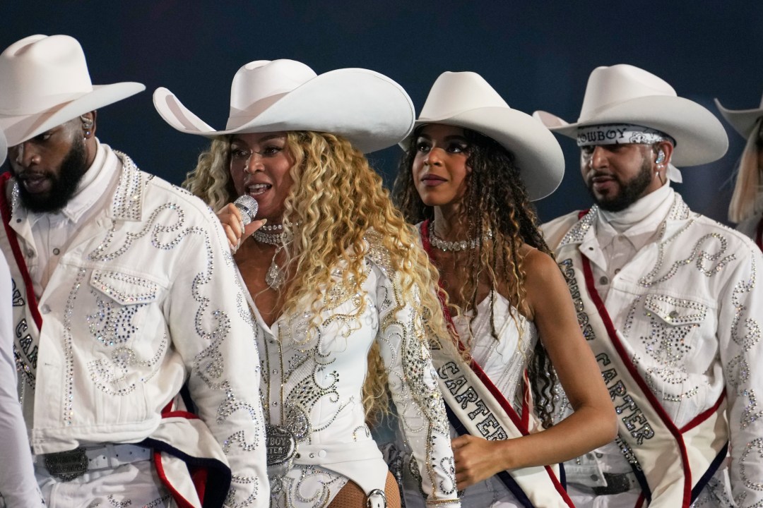 FILE - Beyoncé, center left, and her daughter, Blue Ivy Carter, perform during halftime of an NFL football game between the Baltimore Ravens and Houston Texans Wednesday, Dec. 25, 2024, in Houston. (AP Photo/David J. Phillip, File)