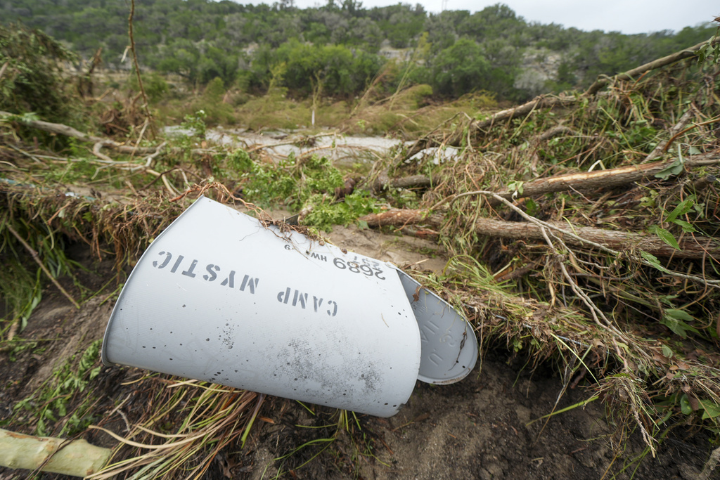 Camp Mystic mailbox lays in a pile of debris
