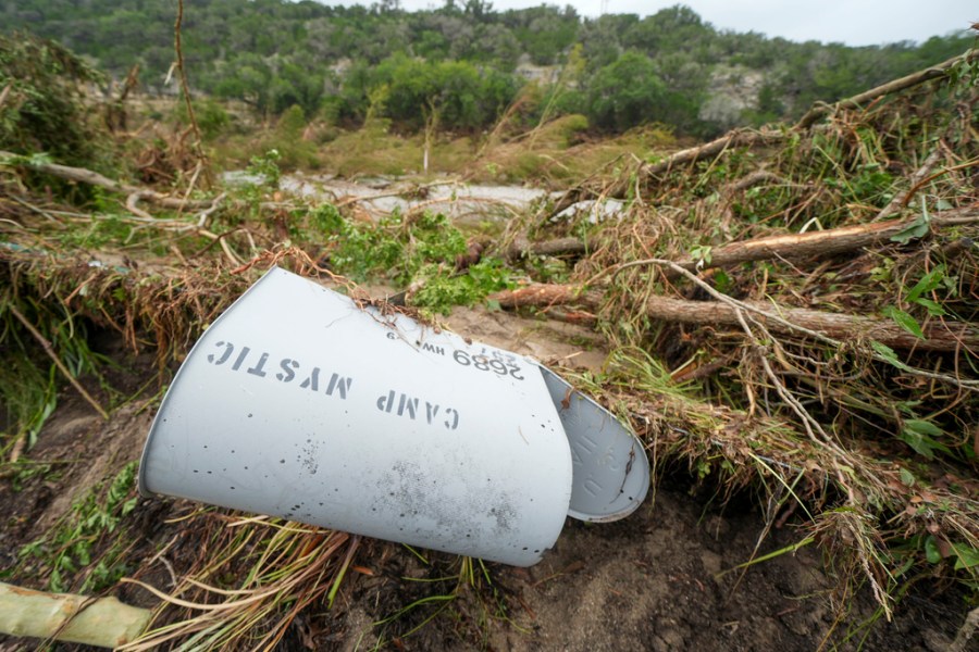 Camp Mystic mailbox lays in a pile of debris