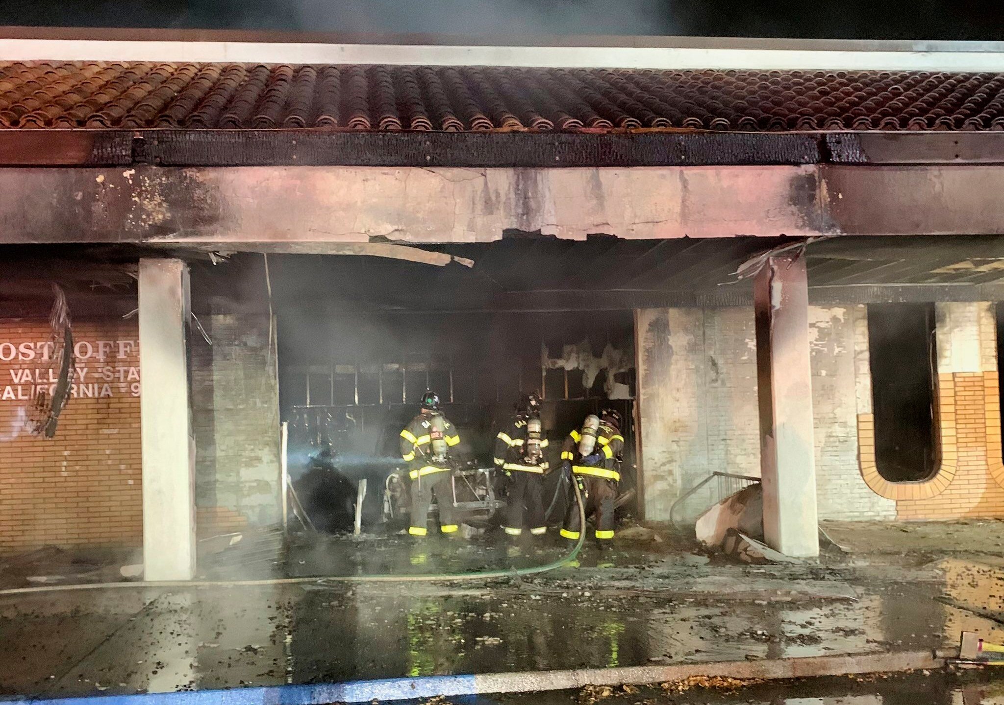 Firefighters fight fire at post office