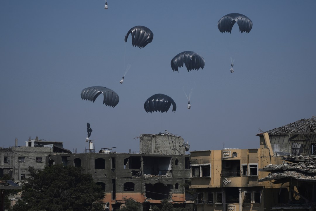 Humanitarian aid is airdropped to Palestinians over northern Gaza Strip