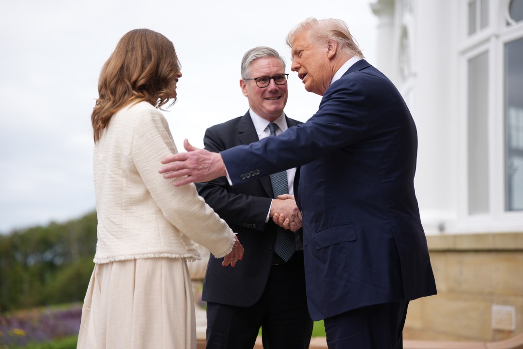 U.S. President Donald Trump greets British Prime Minister Keir Starmer and his wife Victoria Starmer.