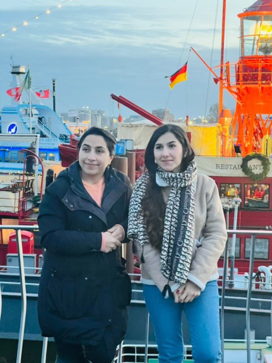 Breshna and Sonia Azatyar pose for a picture in Europe