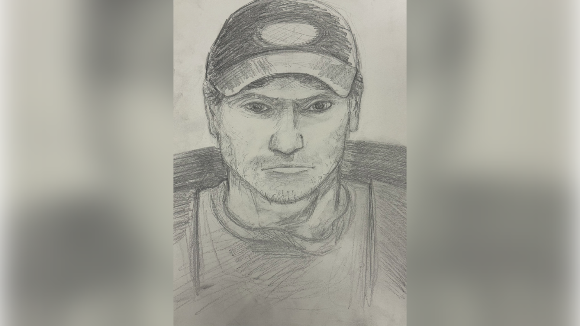 sketch of man wearing a baseball cap