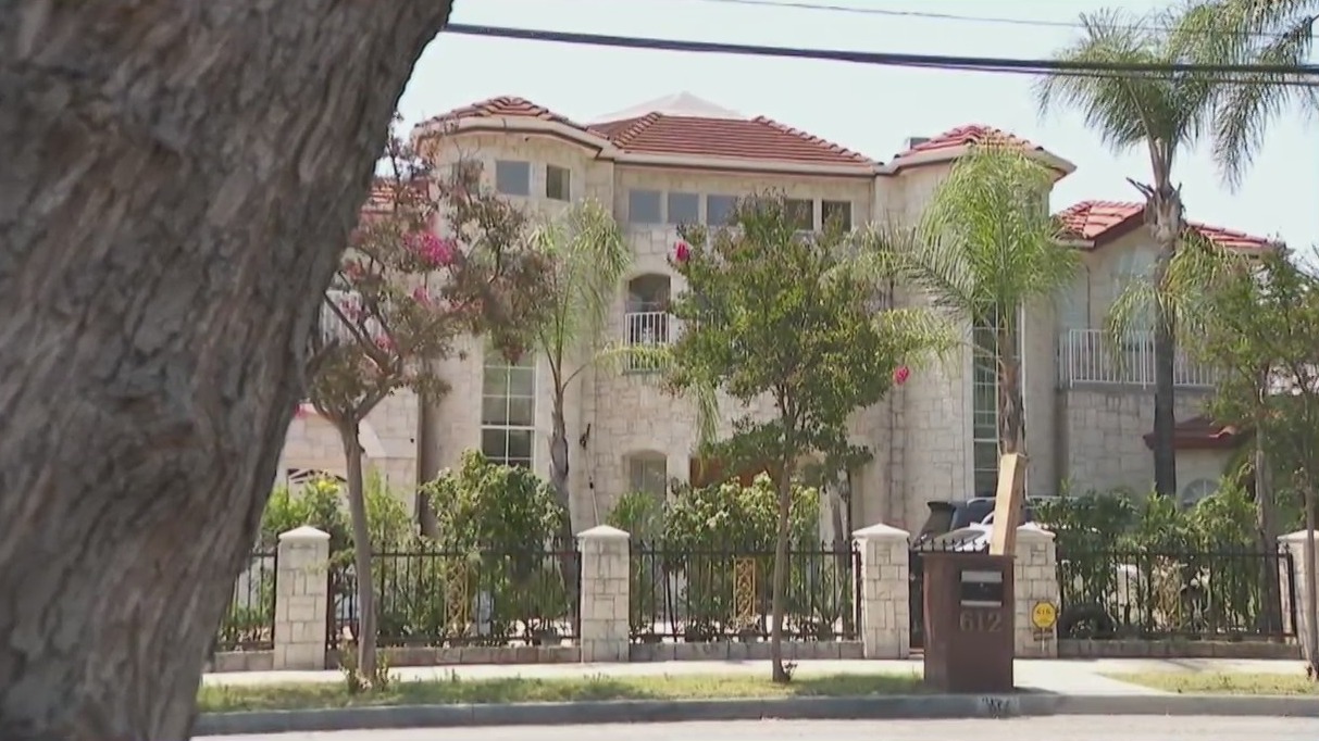 The investigation began when a hospital contacted police about suspected abuse of the 2-month-old. When officers arrived at the home, they found what has been described as a hotel-like setup with a clerk at the front desk.