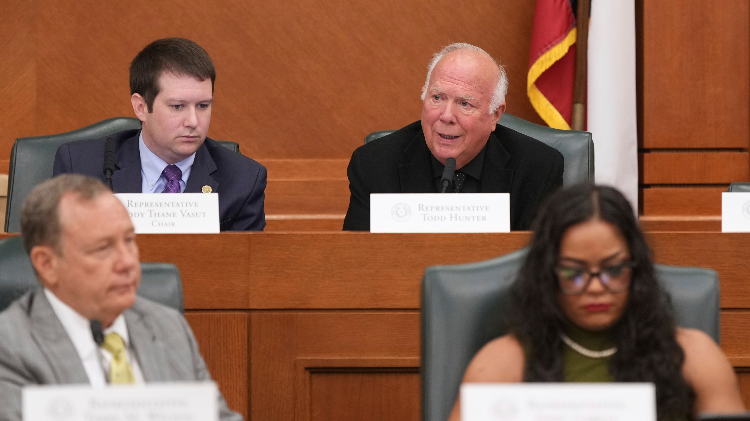 Texas State Rep. Todd Hunter, top right, speaks during a public hearing on congressional resistricting in Austin, Texas, Friday, Aug. 1, 2025. (AP Photo/Eric Gay)