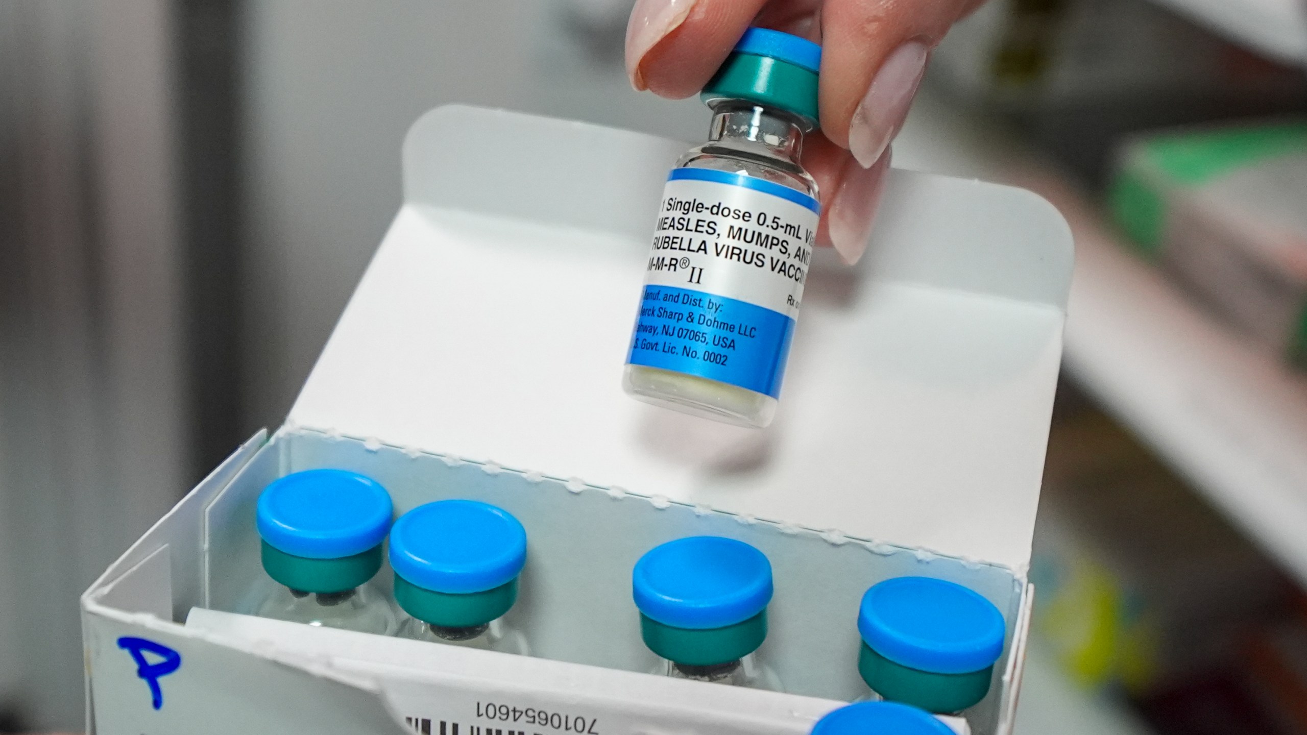 FILE - Vials of the measles mumps and rubella (MMR) vaccine are displayed in Lubbock, Texas, on Tuesday, Feb. 25, 2025. (AP Photo/Julio Cortez, File)