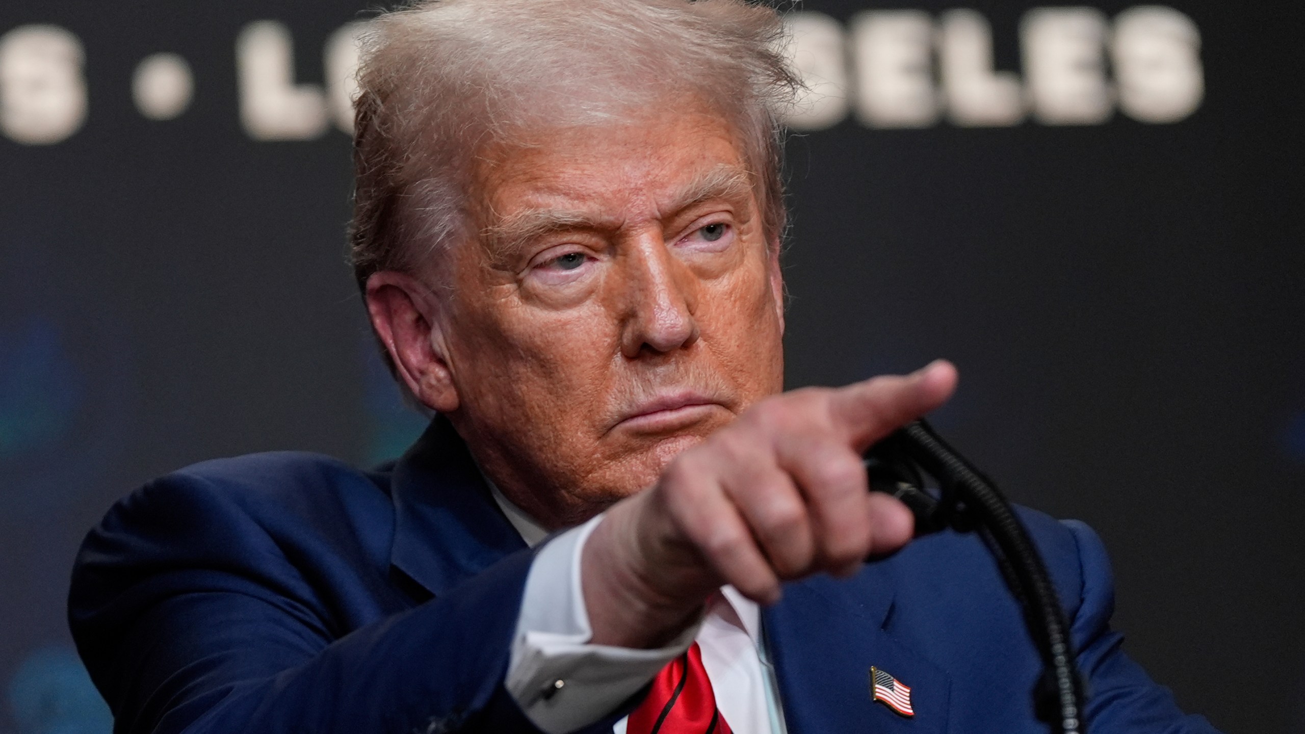 President Donald Trump speaks before signing an executive order about the 2028 Los Angeles Olympic Games, in the South Court Auditorium of the Eisenhower Executive Office Building on the White House campus, Tuesday, Aug. 5, 2025, in Washington. (AP Photo/Julia Demaree Nikhinson)