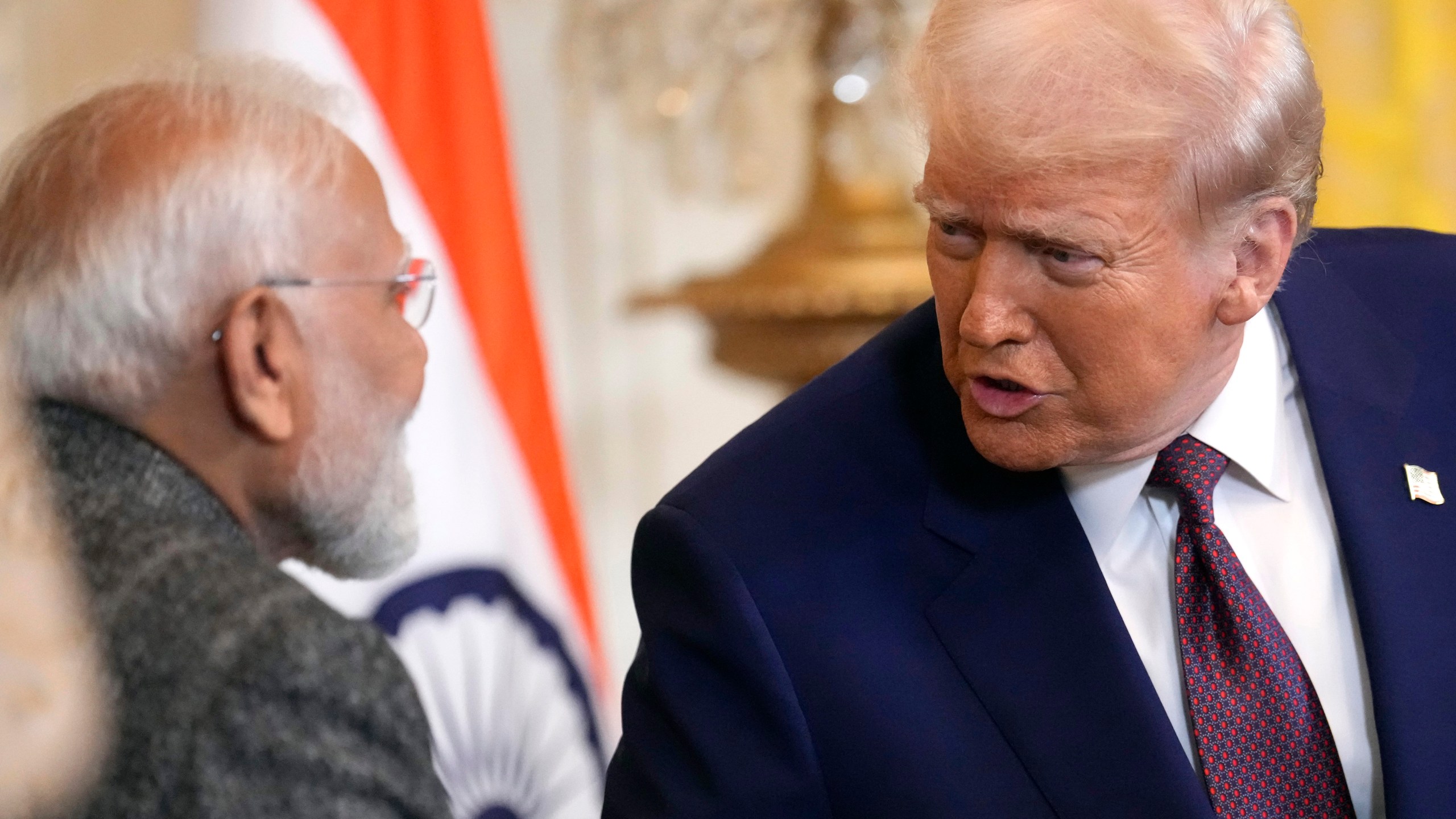 FILE - President Donald Trump, right, speaks with India's Prime Minister Narendra Modi during a news conference in the East Room of the White House, Feb. 13, 2025, in Washington. (AP Photo/Ben Curtis, File)