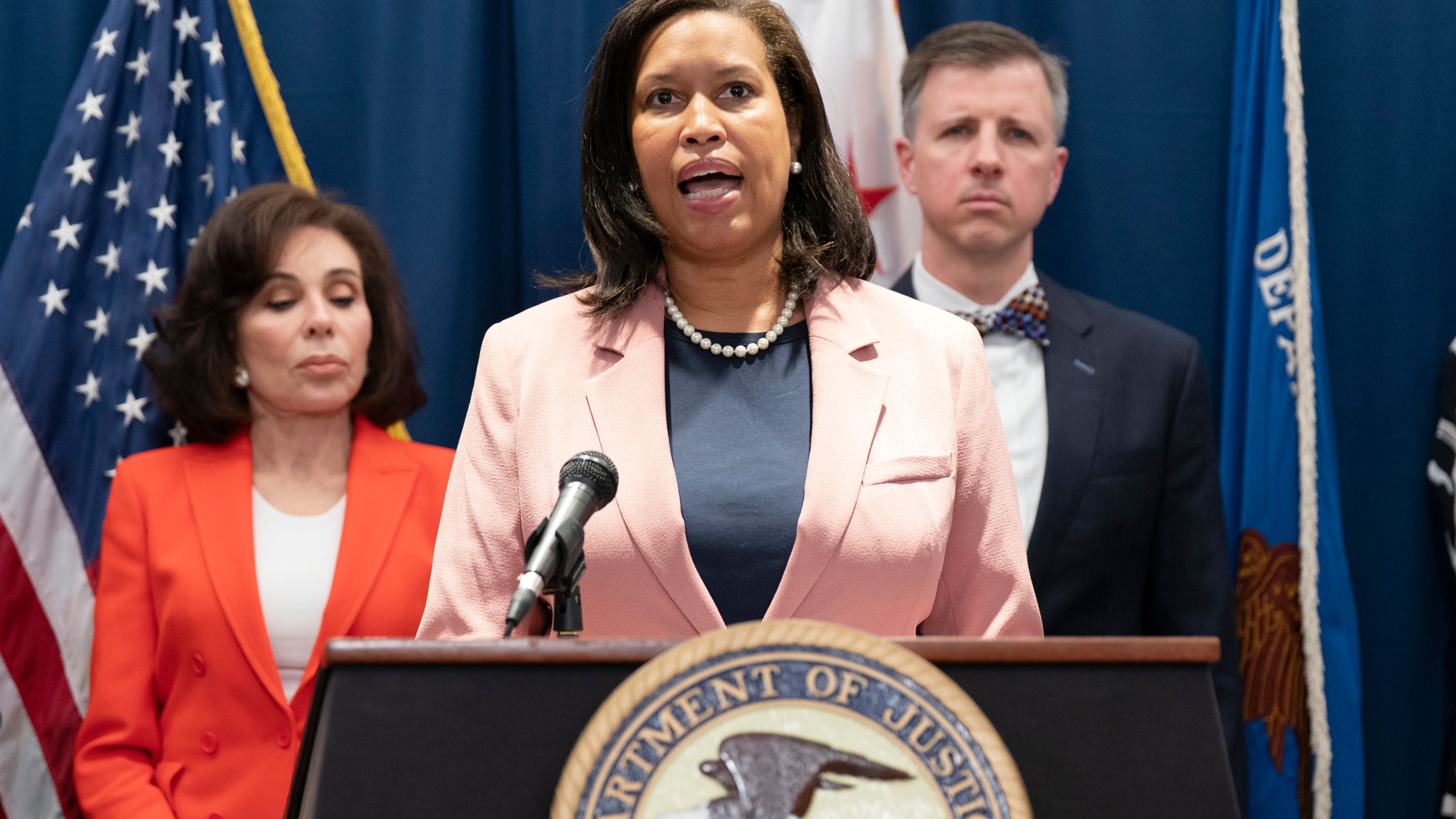 FILE - Mayor of the District of Columbia Muriel Bowser speaks as U.S. Attorney Jeanine Ferris Pirro, left, listens during a news conference in Washington, May 22, 2025. (AP Photo/Jose Luis Magana, File)